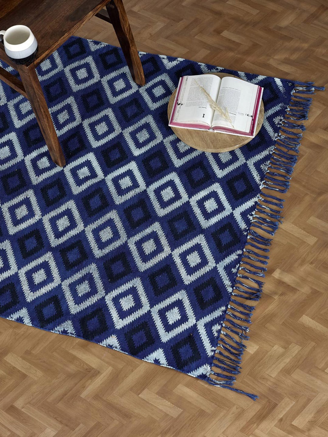 

Fabindia Blue & Black Geometric Self-Design Cotton Dhurries