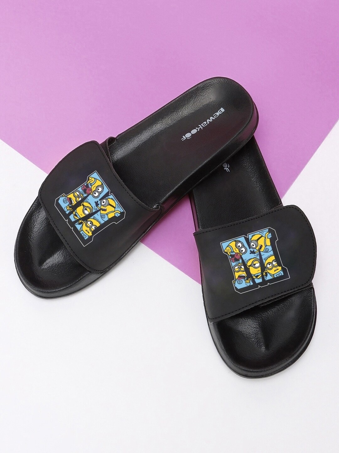 

Bewakoof Women Team Minion Printed Adjustable Velcro Sliders Sliders, Black