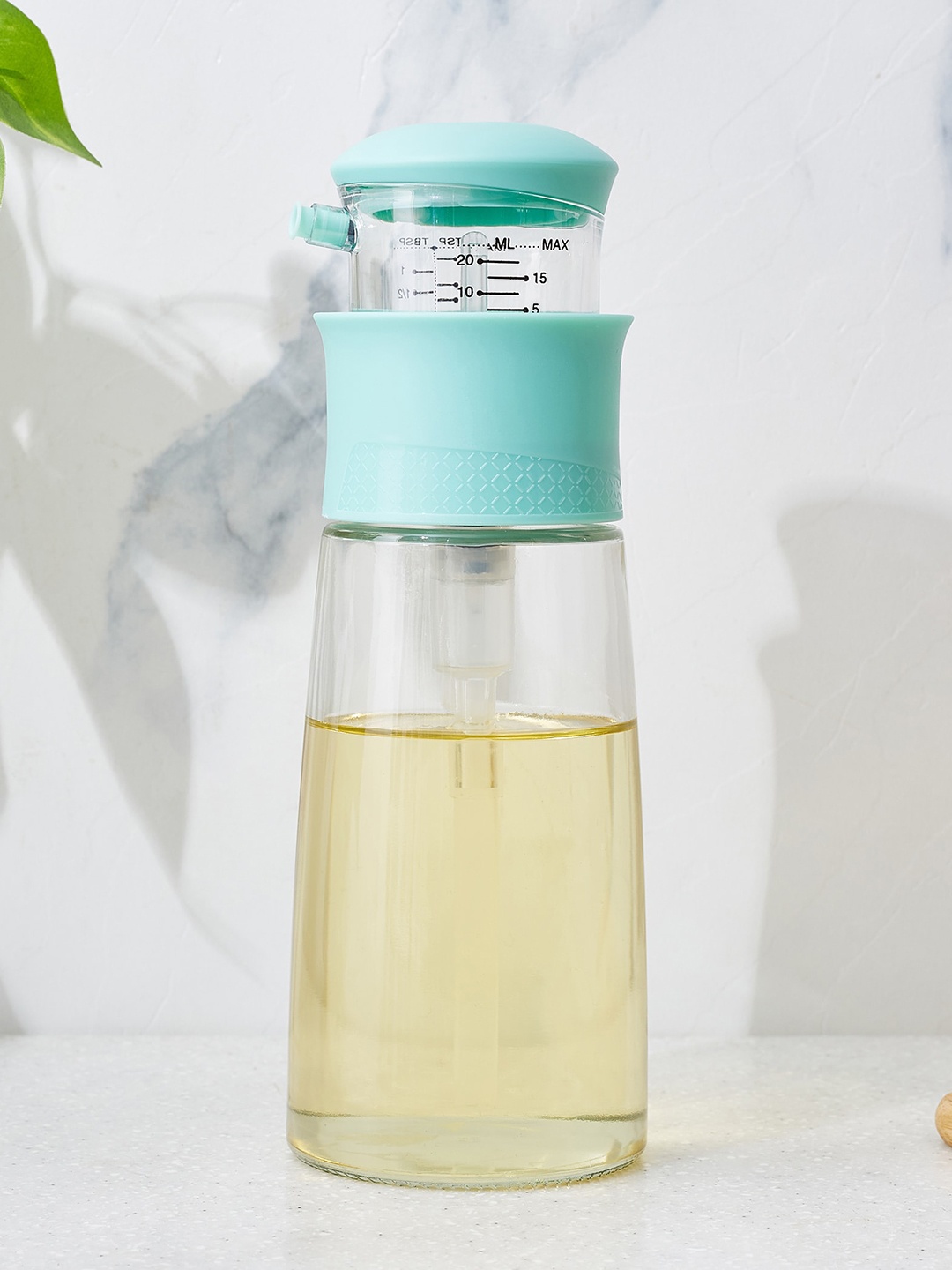 

Home Centre Green & Transparent Glass Oil Dispenser With Measuring Press