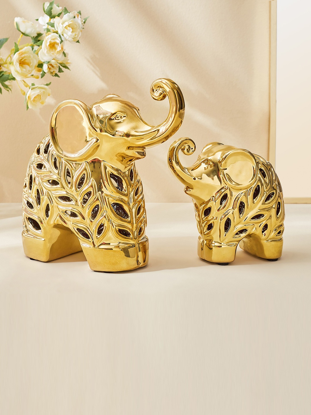 

Home Centre Stellar Fantasy 2 Pcs Golden Textured Elephant Figurine Showpieces, Gold