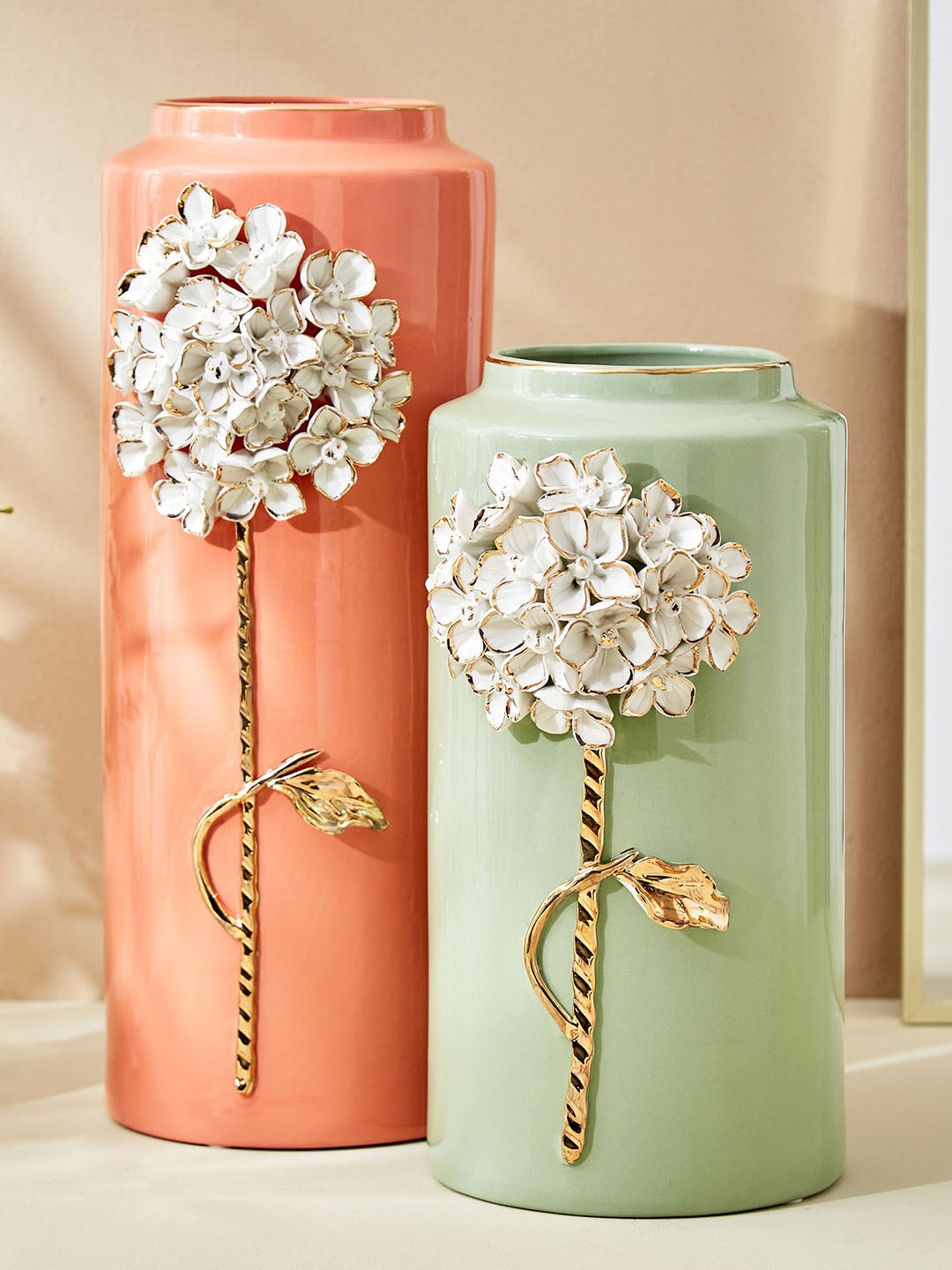 

Home Centre Moksha Peach-Colored Floral Ceramic Vase