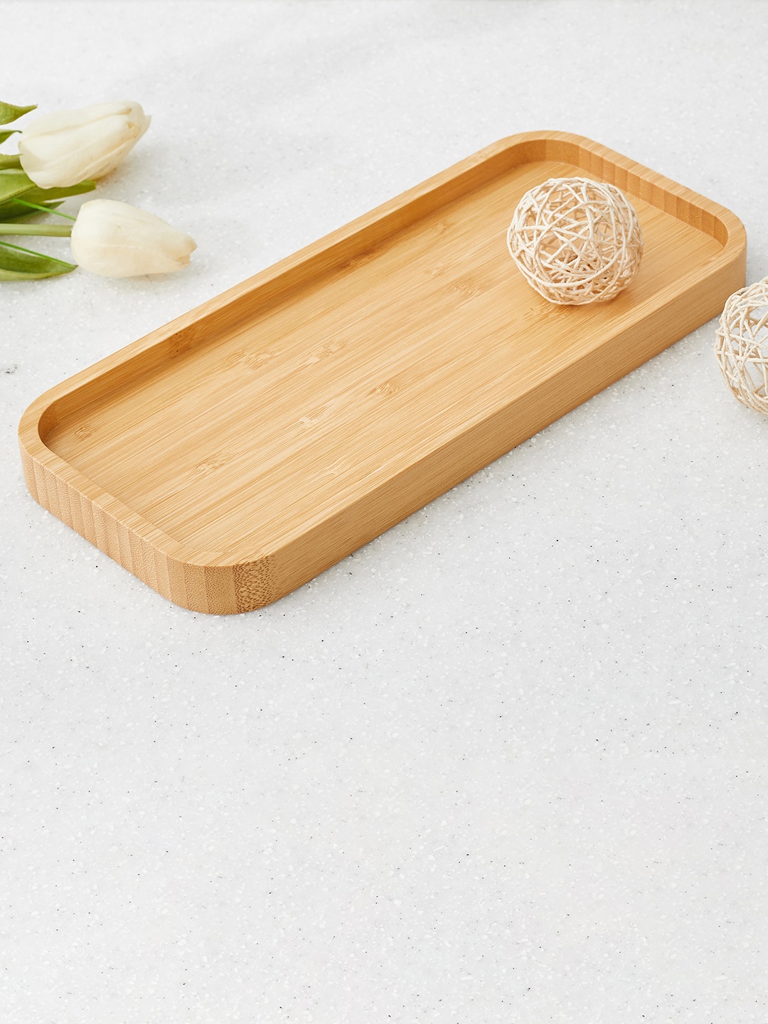 

Home Centre Brown Senegal Bamboo Tray