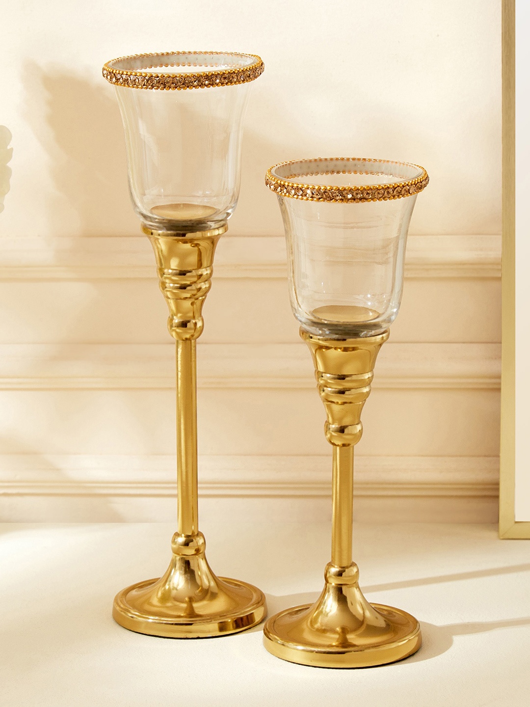 

Home Centre Golden 2 Pieces Fables Blane Pedestal Glass T-Light Candle Holders, Gold