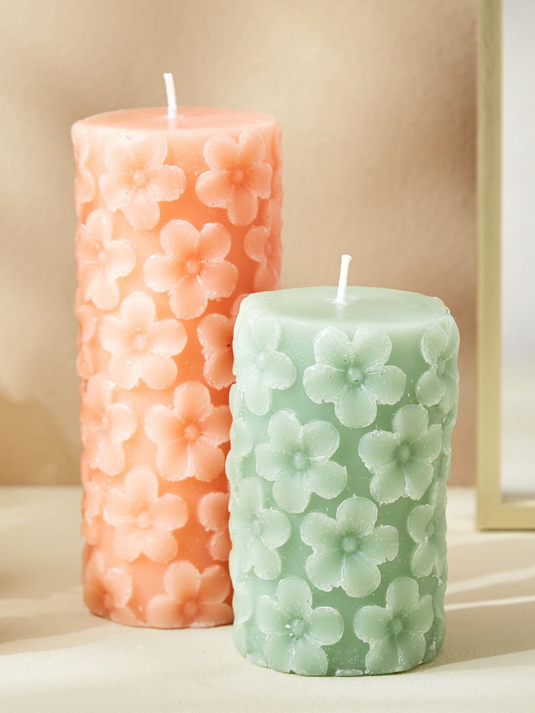

Home Centre Moksha Green Petal Scented Pillar Candle