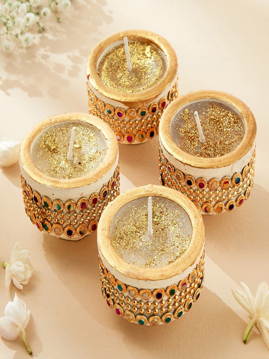 

Home Centre Utsav White 4 Pieces Earthen Clay Handi Diya Candles