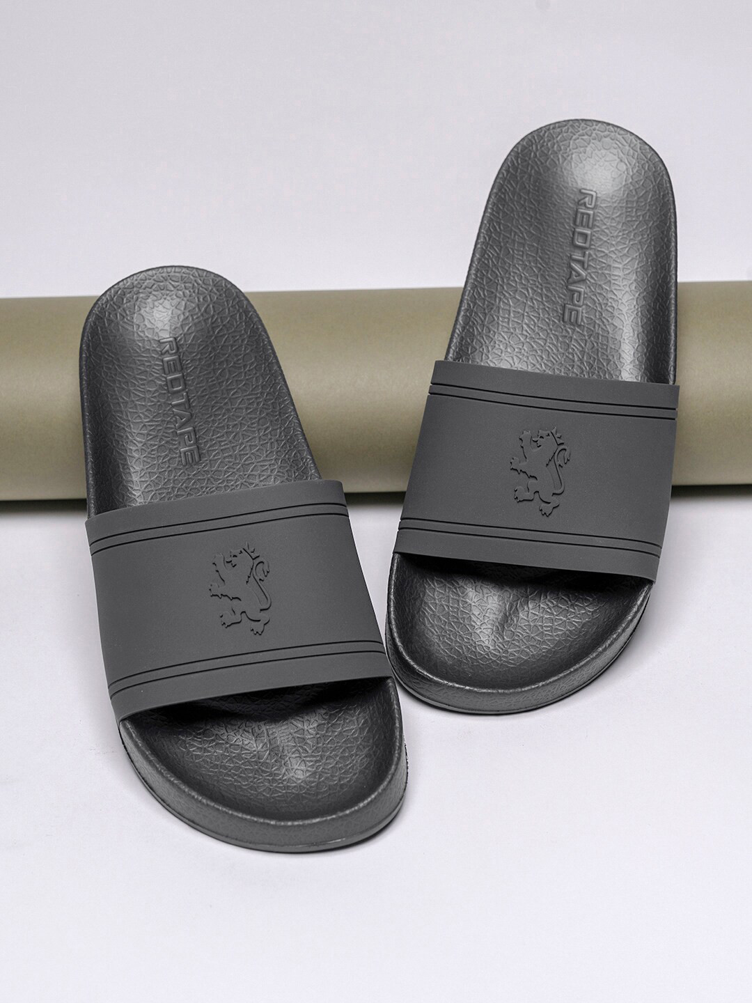 

Red Tape Men Self Design Slip-Resistance & Shock Absorption Sliders, Grey