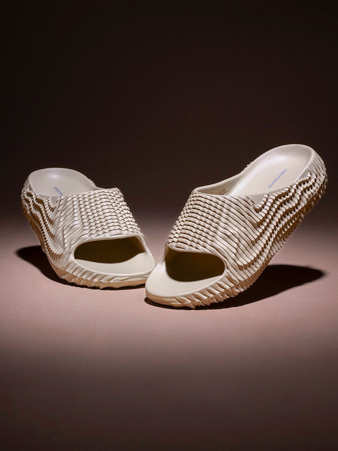 

Red Tape Men Self Design Slip-Resistance Sliders, Beige