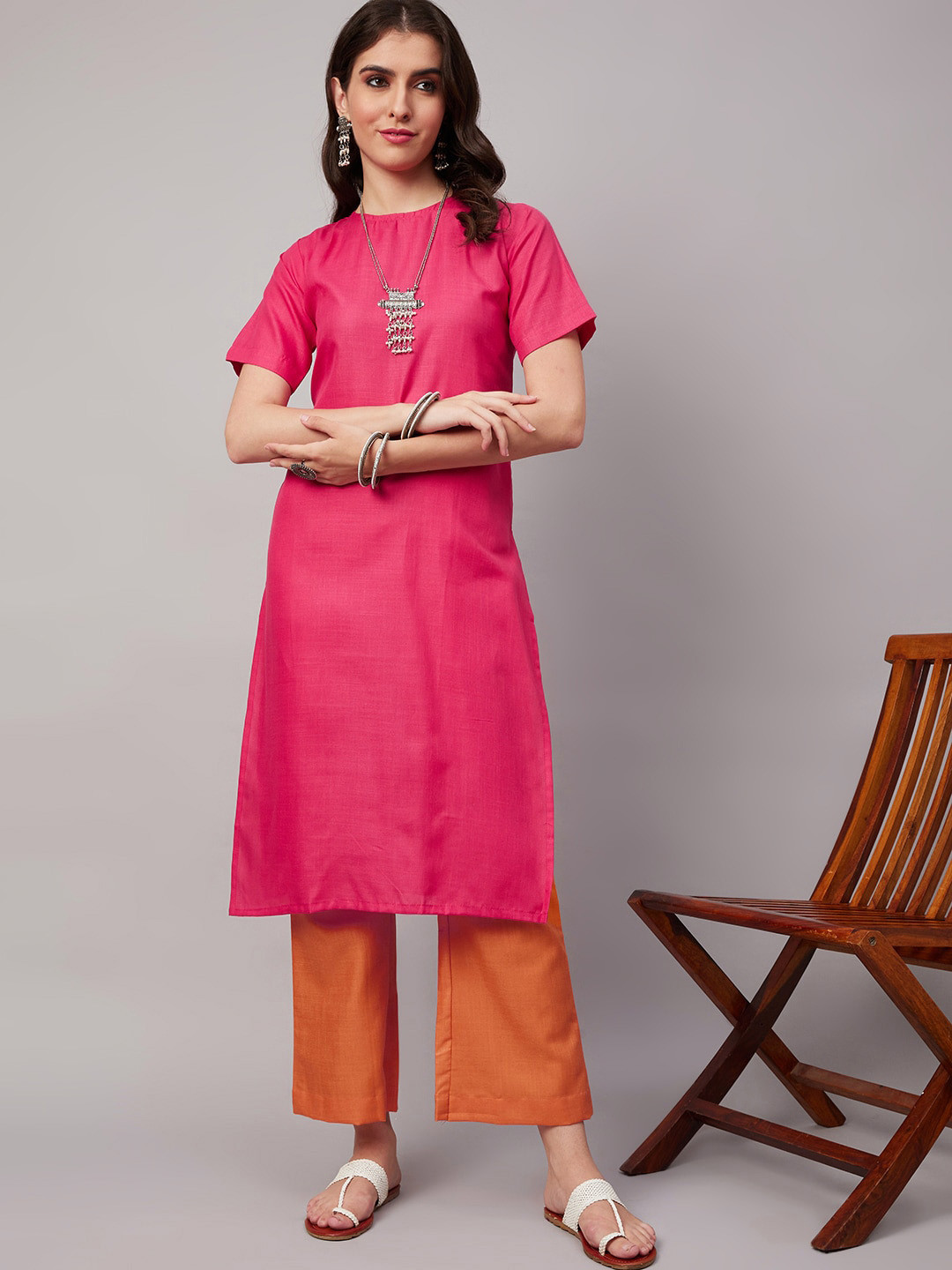 

HERE&NOW Pink Round Neck Regular Kurta with Palazzos