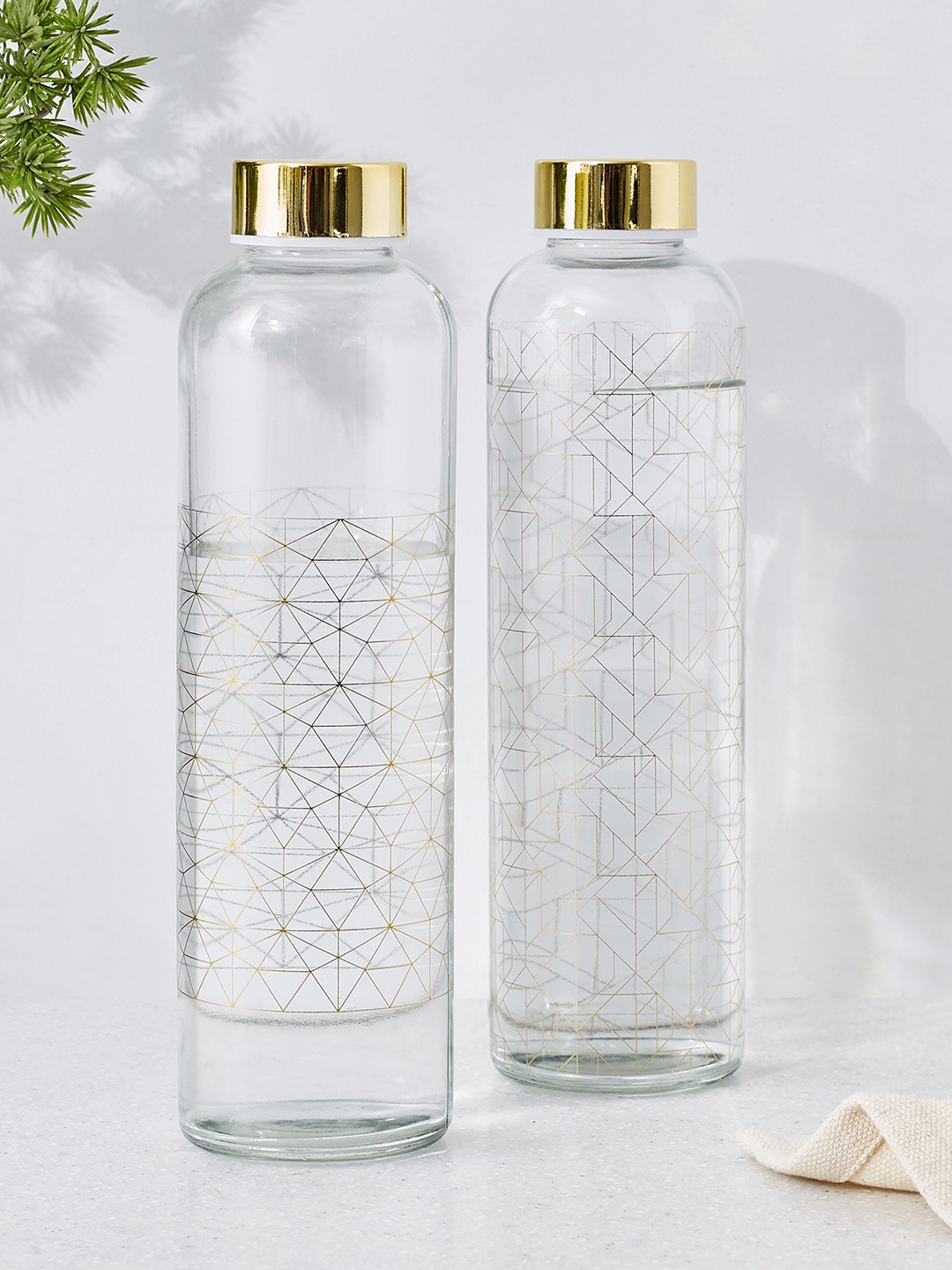 

Home Centre Travis Transparent 2 Pieces Printed Glass Water Bottles - 600ml