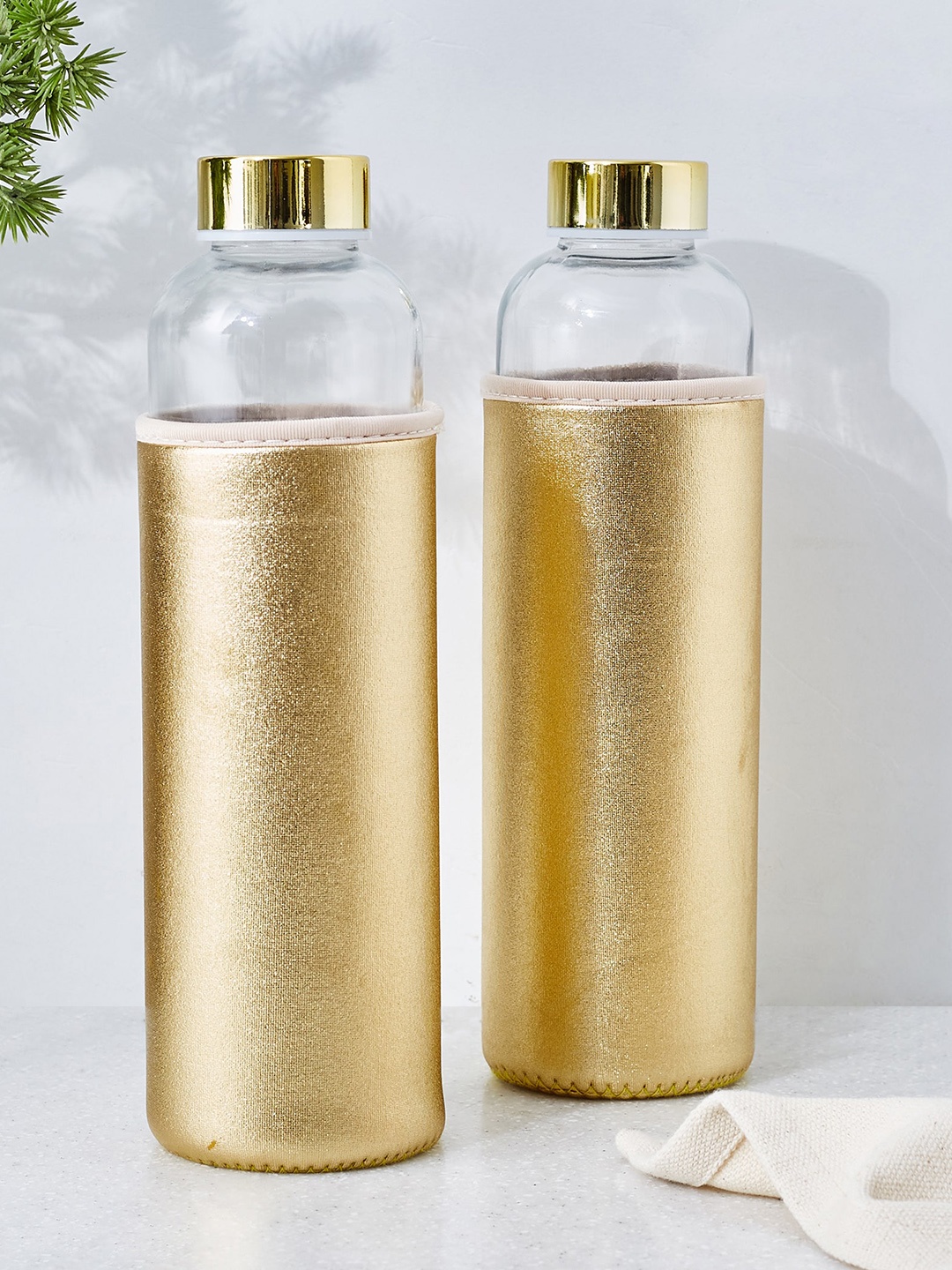 

Home Centre Travis 2 Pcs Golden Glass Water Bottles with Covers- 600 ML Each, Gold