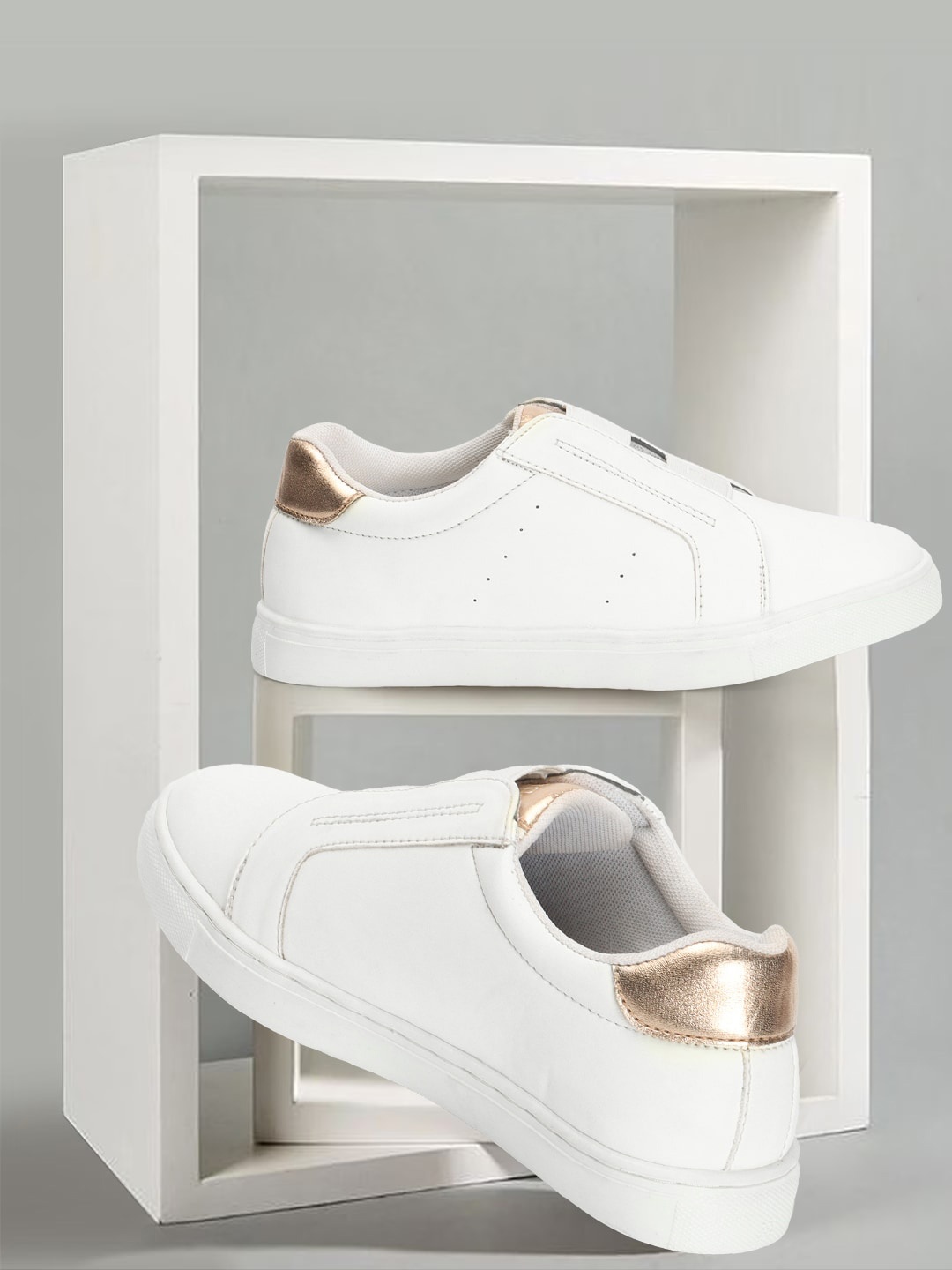 

Carlton London sports Women Perforated Lightweight Slip-On Sneakers, White