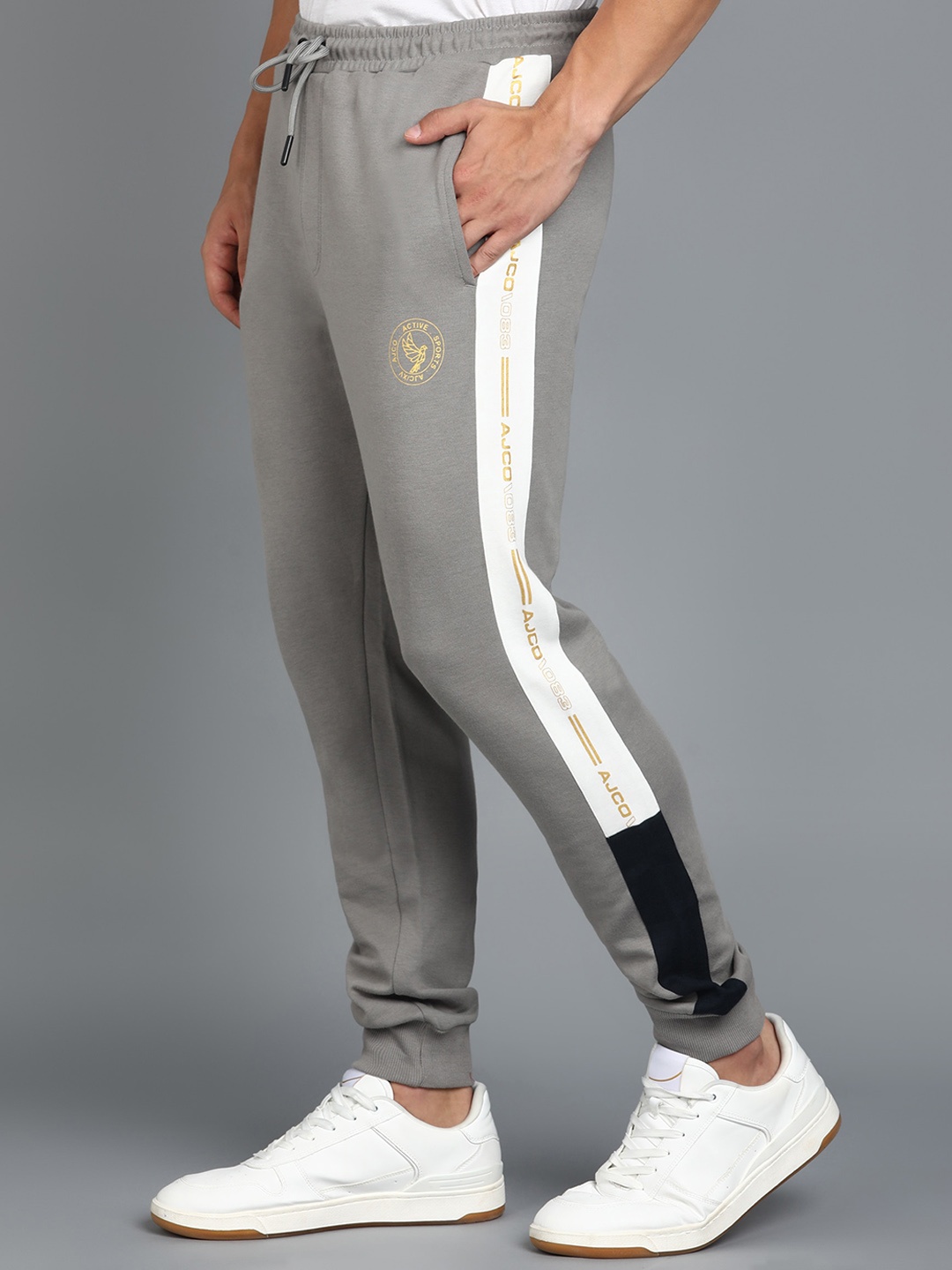 

Alan Jones Men Mid-Rise Slim Fit Joggers, Grey