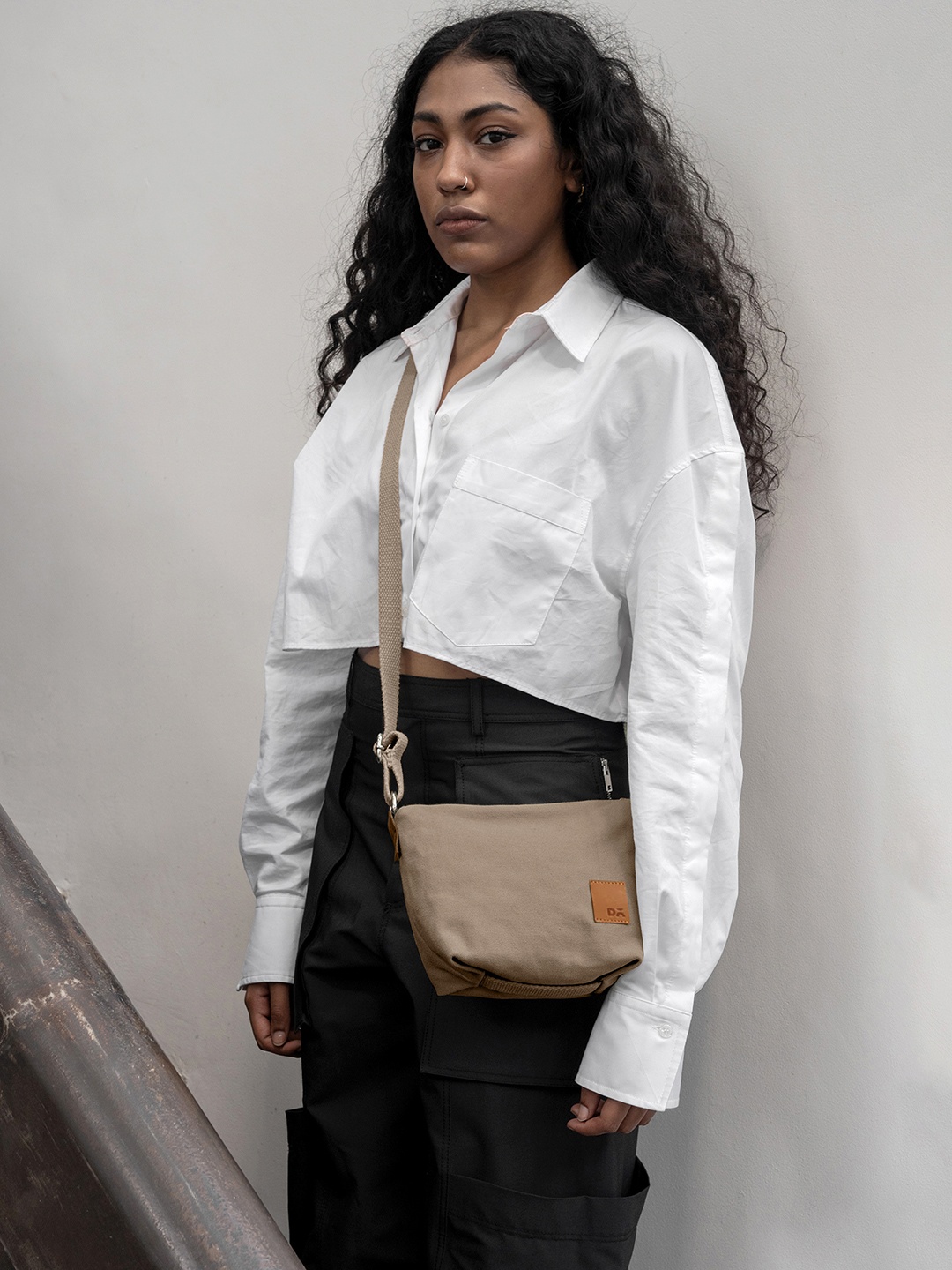 

DailyObjects Structured Sling Bag, Beige