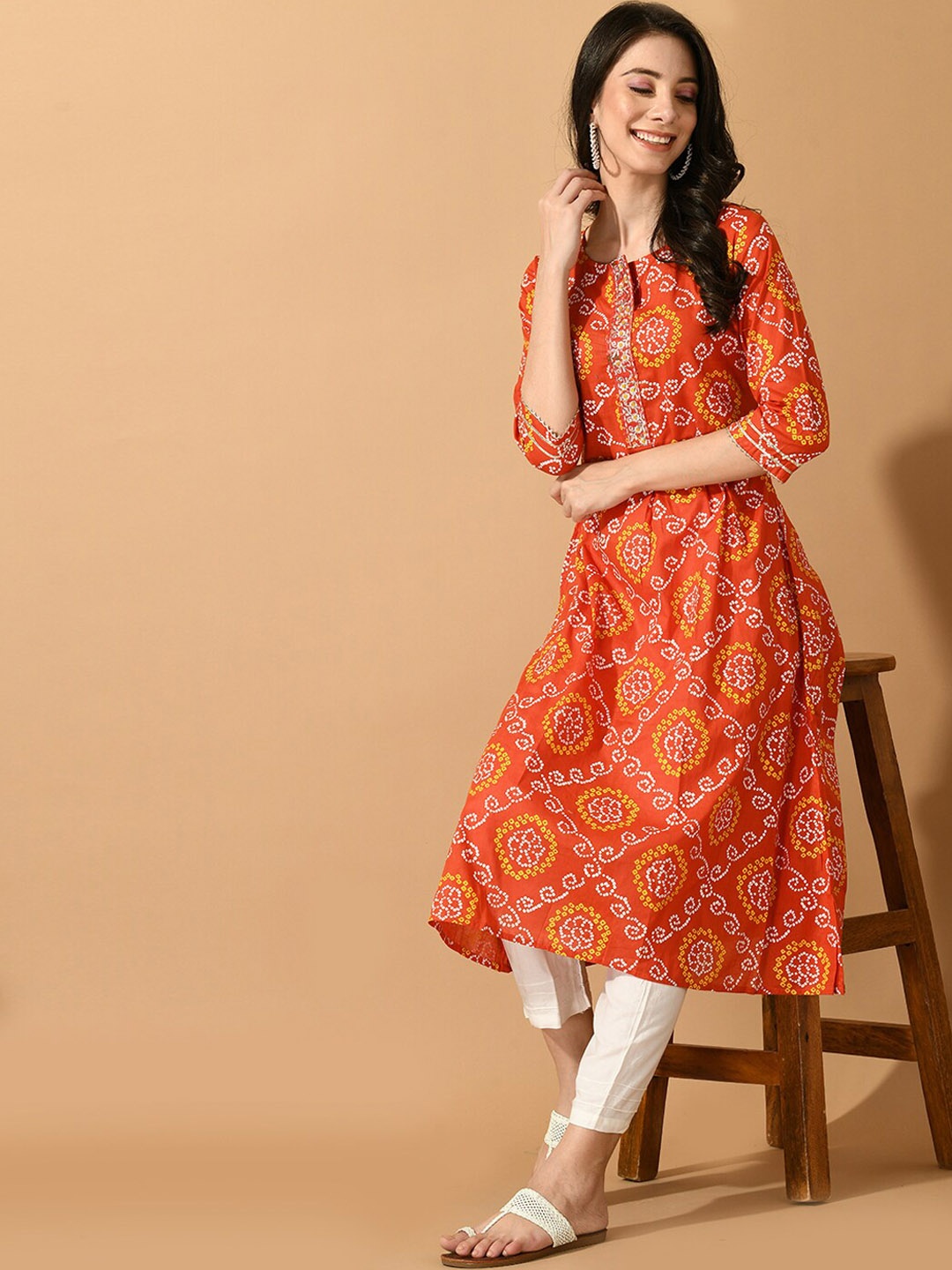 

Sangria Bandhani Printed Pure Cotton Kurta With Trousers, Orange