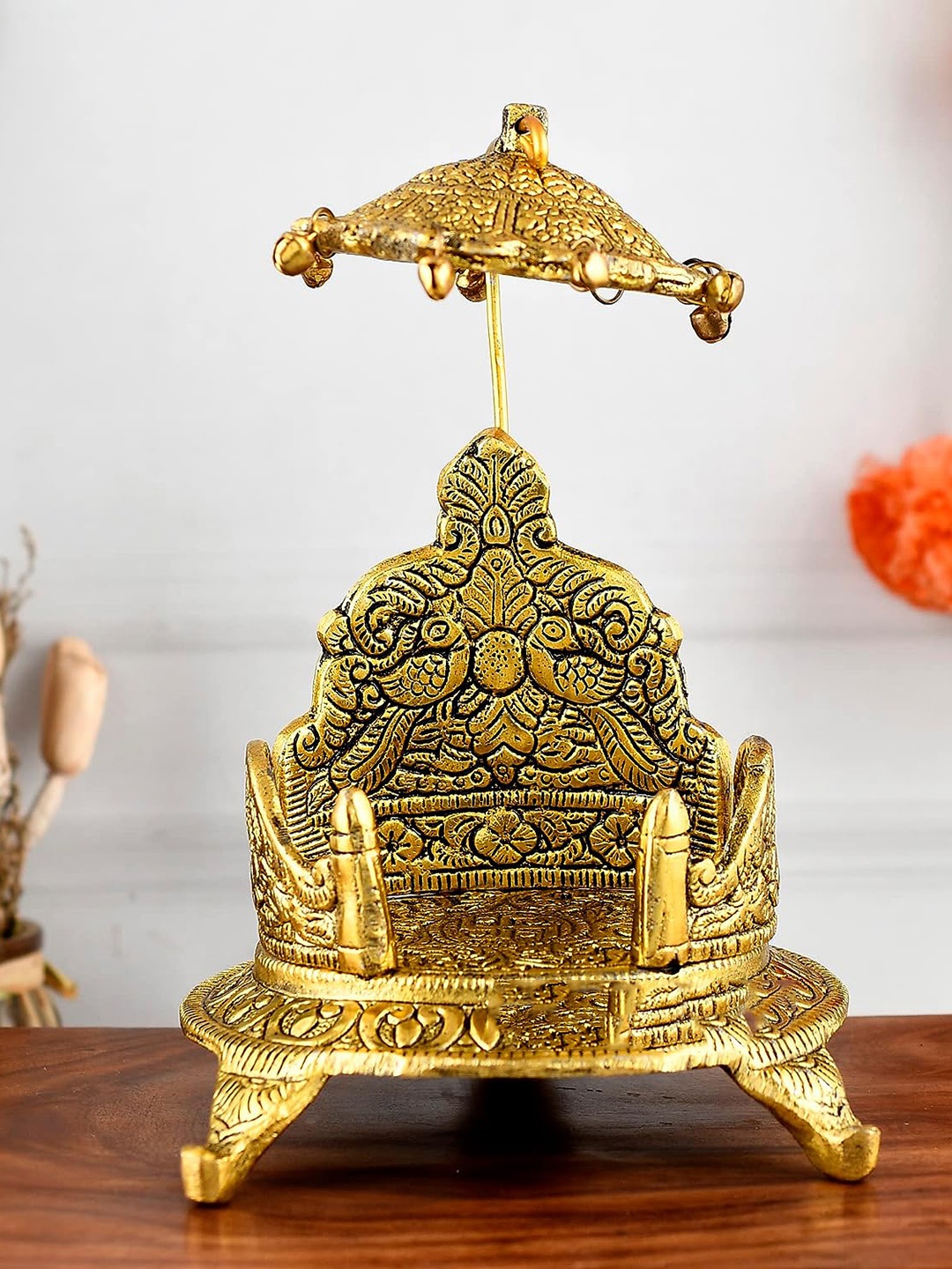 

Ascension Gold Textured Singhasan Oval Shaped For Krishna Metal Showpiece