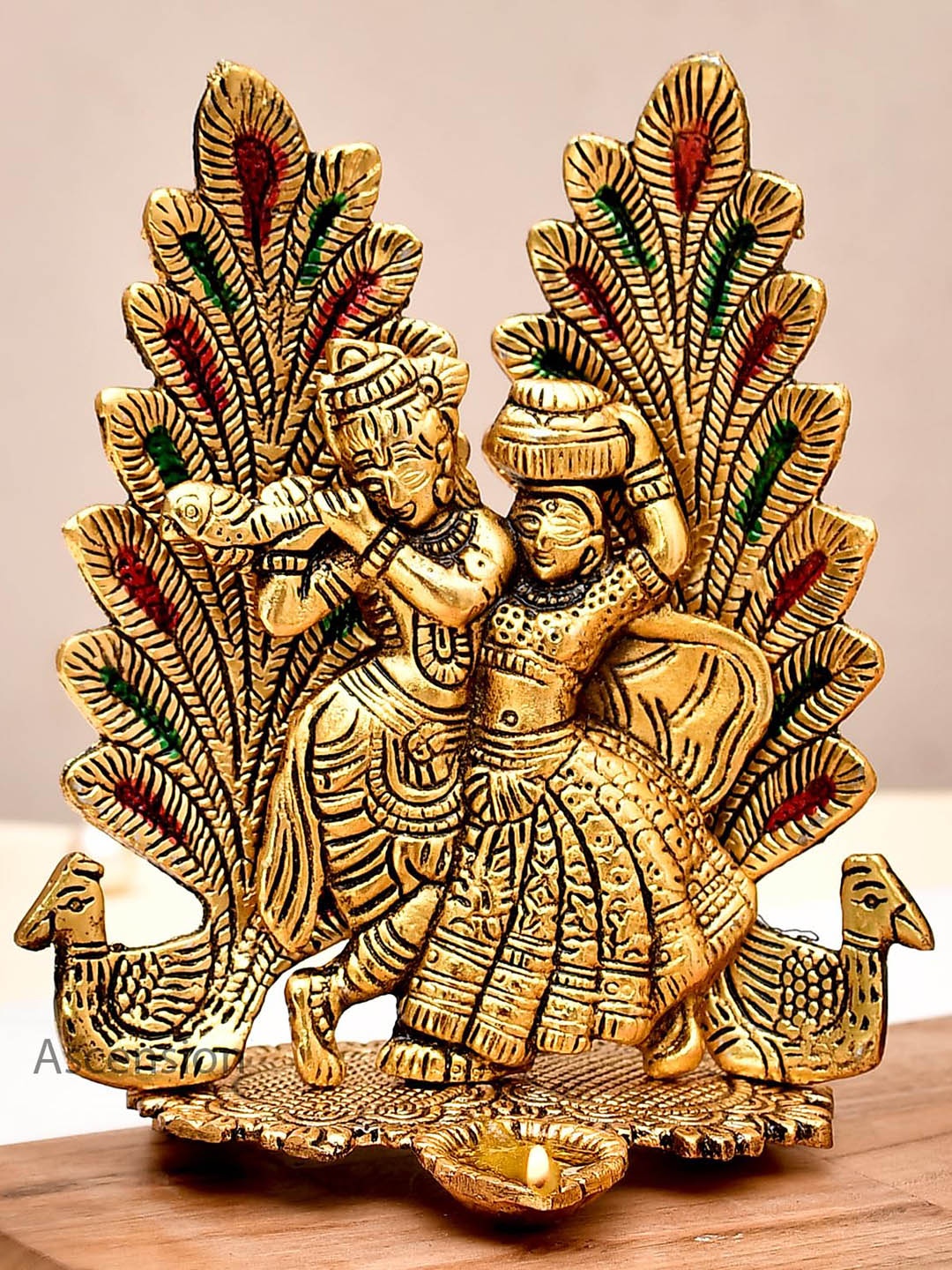 

Ascension Yellow Radha Krishna Statue with Diya Peacock Showpieces