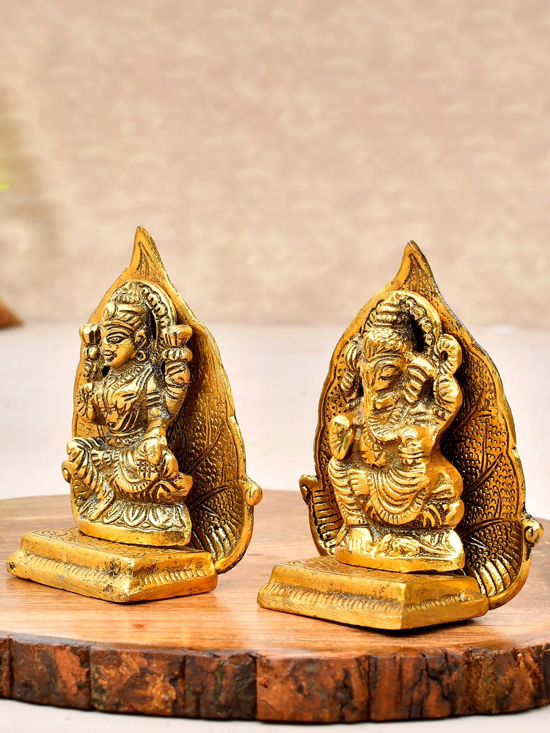 

Ascension Beige Textured Laxmi Ganesh Idol on Leaf Singhasan Showpiece, Gold
