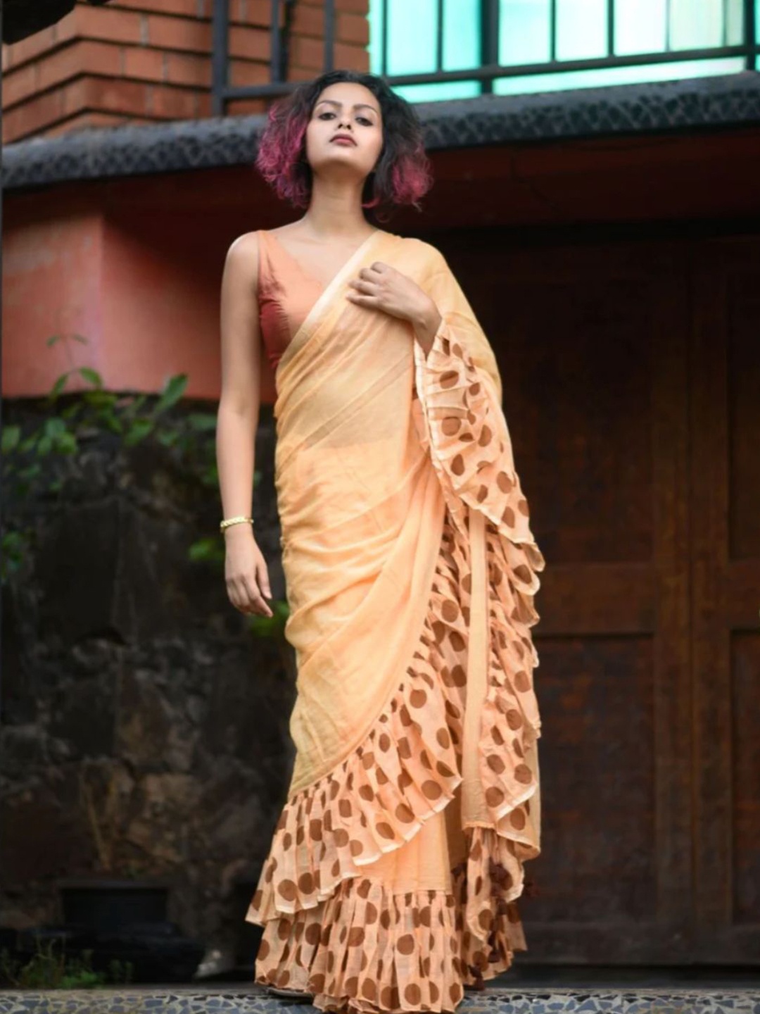 

Suta Orange & Brown Pure Cotton Ruffles Saree
