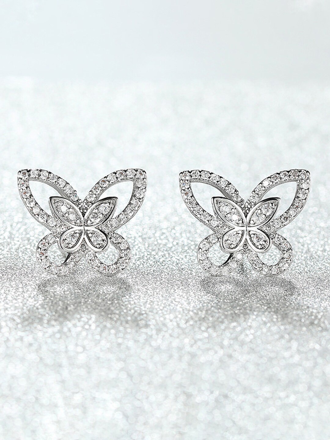 

Jewels Galaxy Silver-Plated American Diamond-Studded Butterfly Shaped Stud Earrings