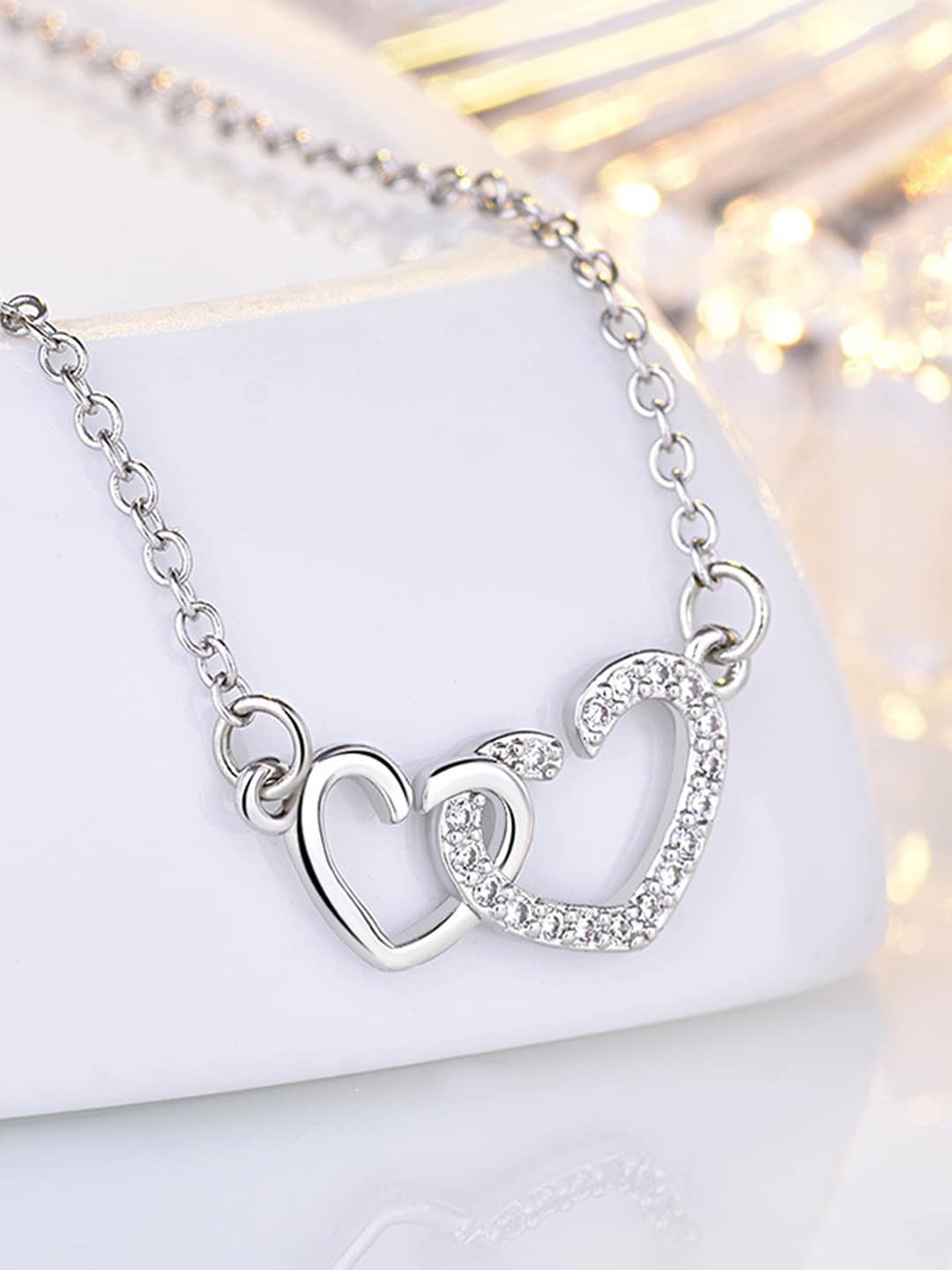 

Jewels Galaxy Silver-Plated Stone-Studded Pendant With Chain