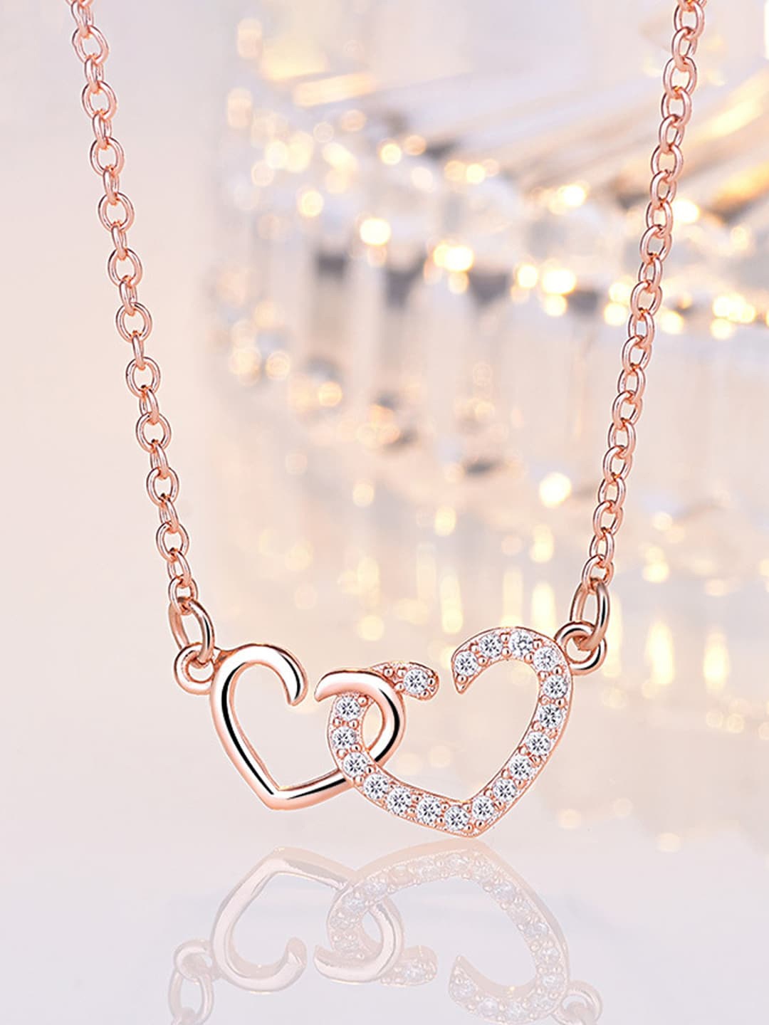 

Jewels Galaxy Rose Gold-Plated Stone-Studded Pendant With Chain