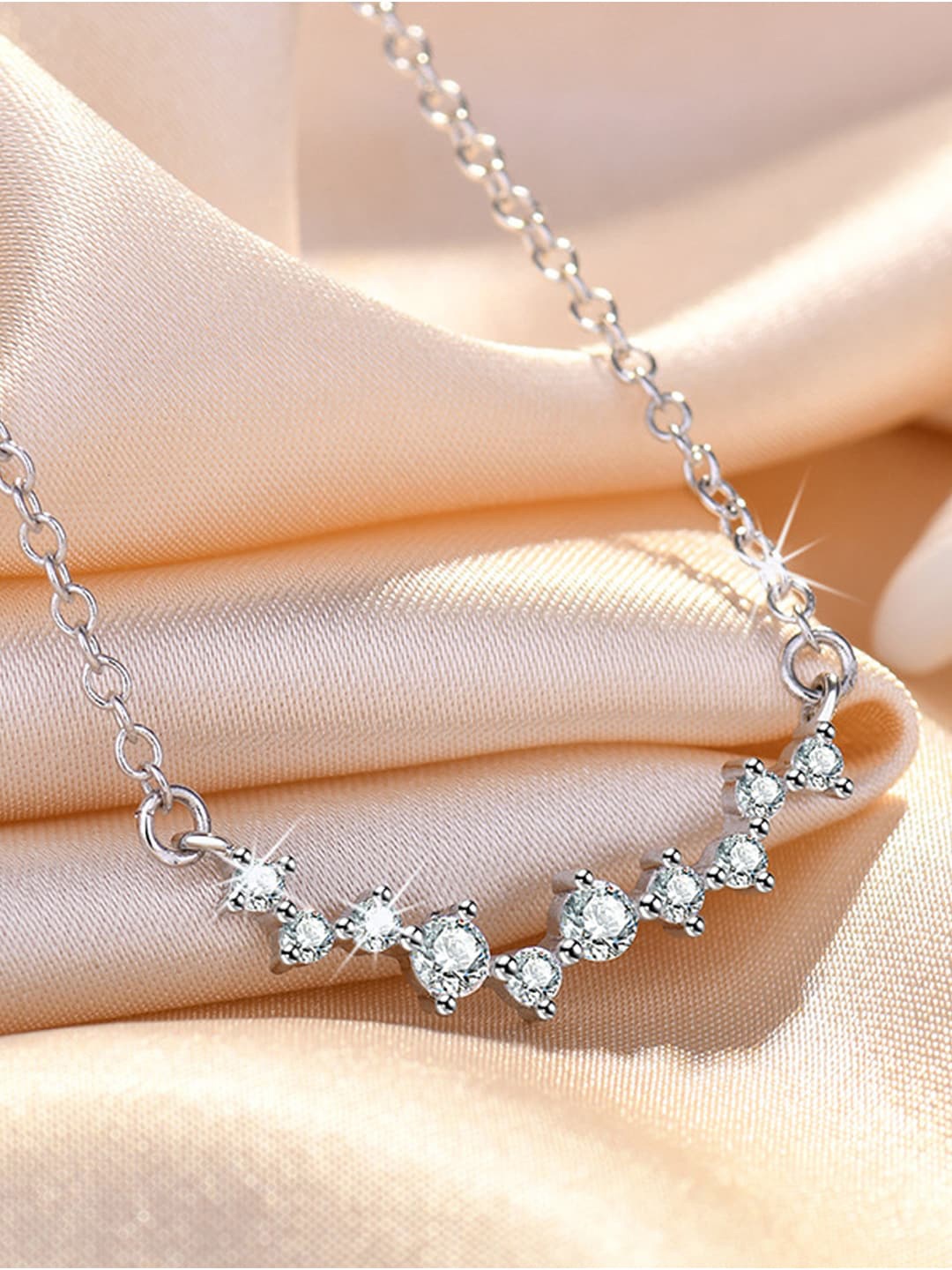 

Jewels Galaxy Silver-Plated Stone-Studded Pendant With Chain