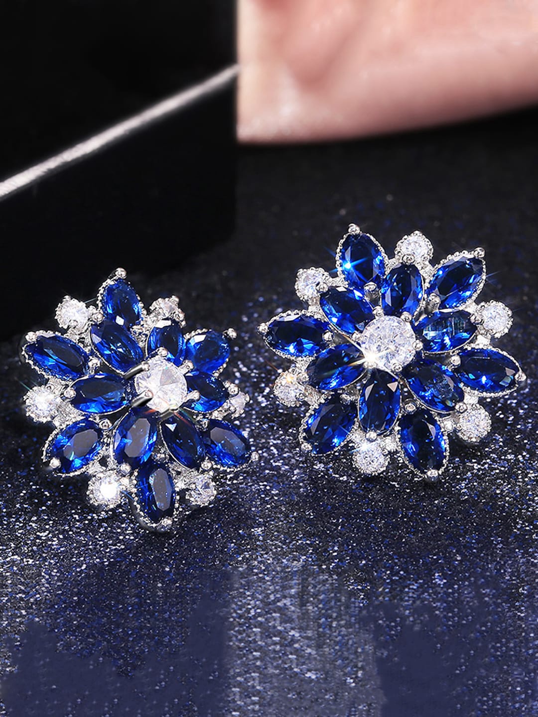 

Jewels Galaxy Silver-Plated American Diamond-Studded Floral Studs Earrings