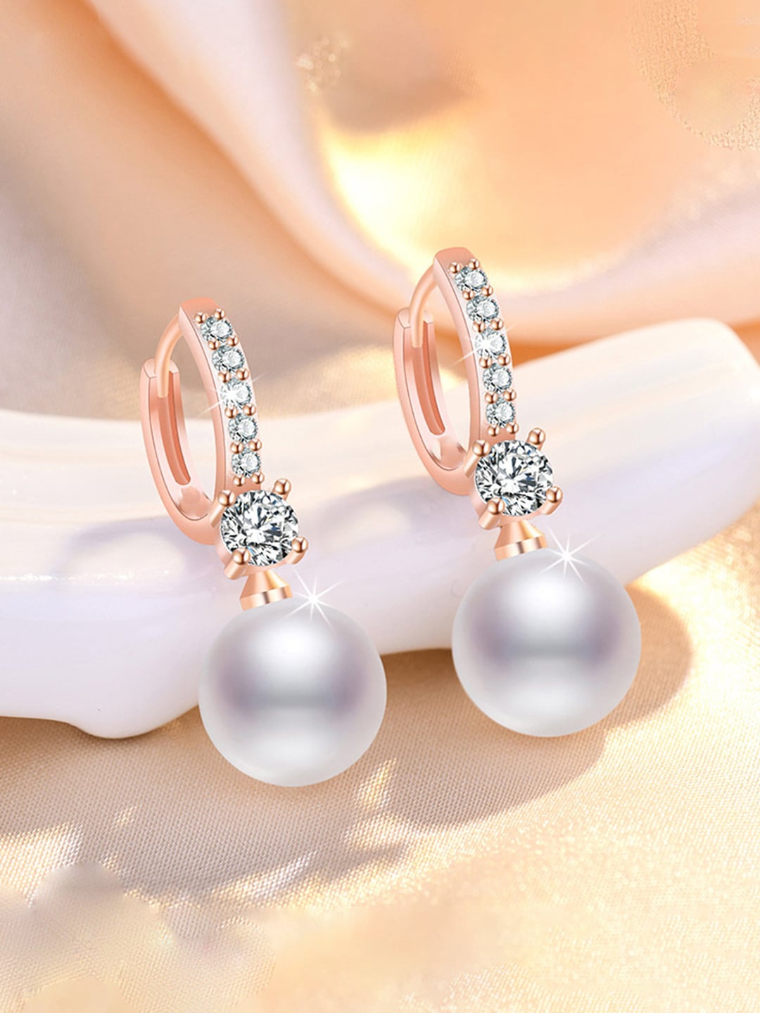 

Jewels Galaxy Rose Gold-Plated Contemporary Studs Earrings