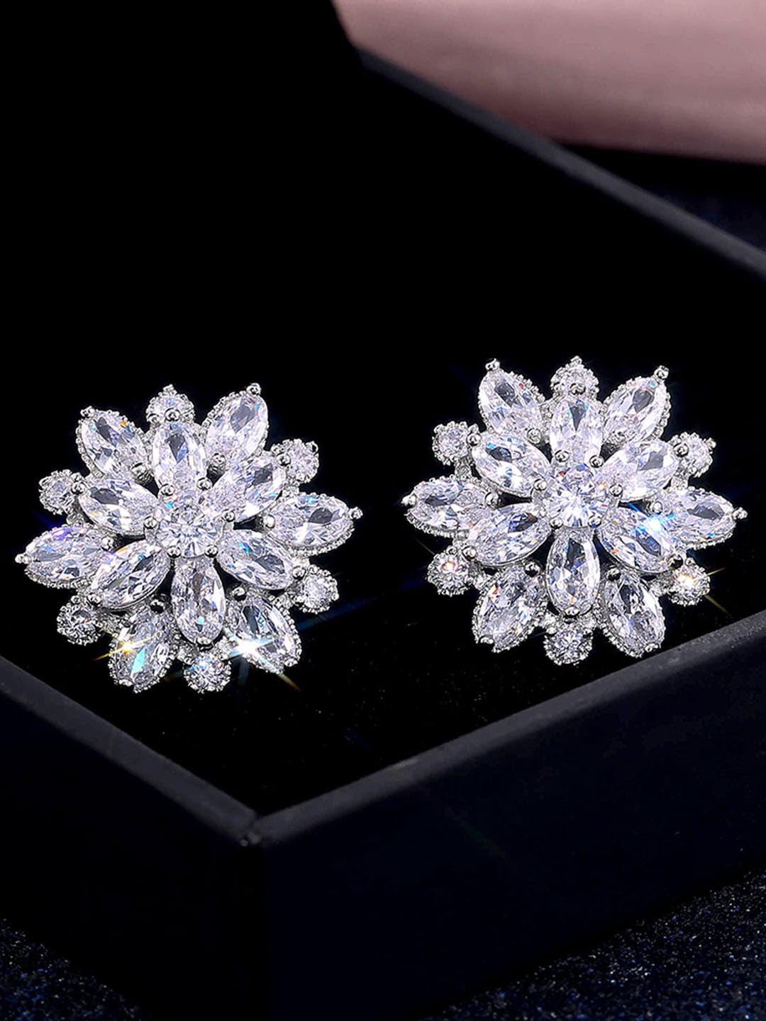 

Jewels Galaxy Silver-Plated Floral Studs Earrings