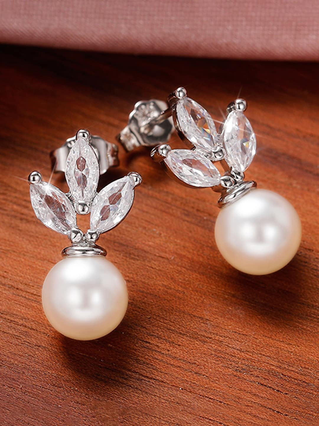 

Jewels Galaxy Silver Plated American Diamond Studded Korean Drop Earrings