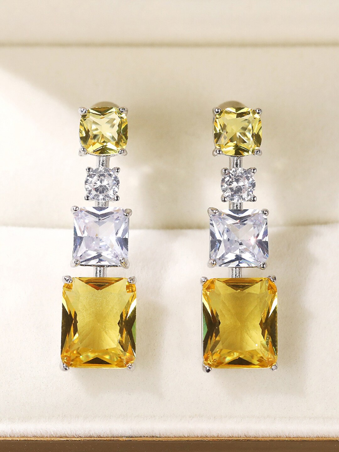 

Jewels Galaxy Silver Plated American Diamond Studded Drop Earrings, Yellow