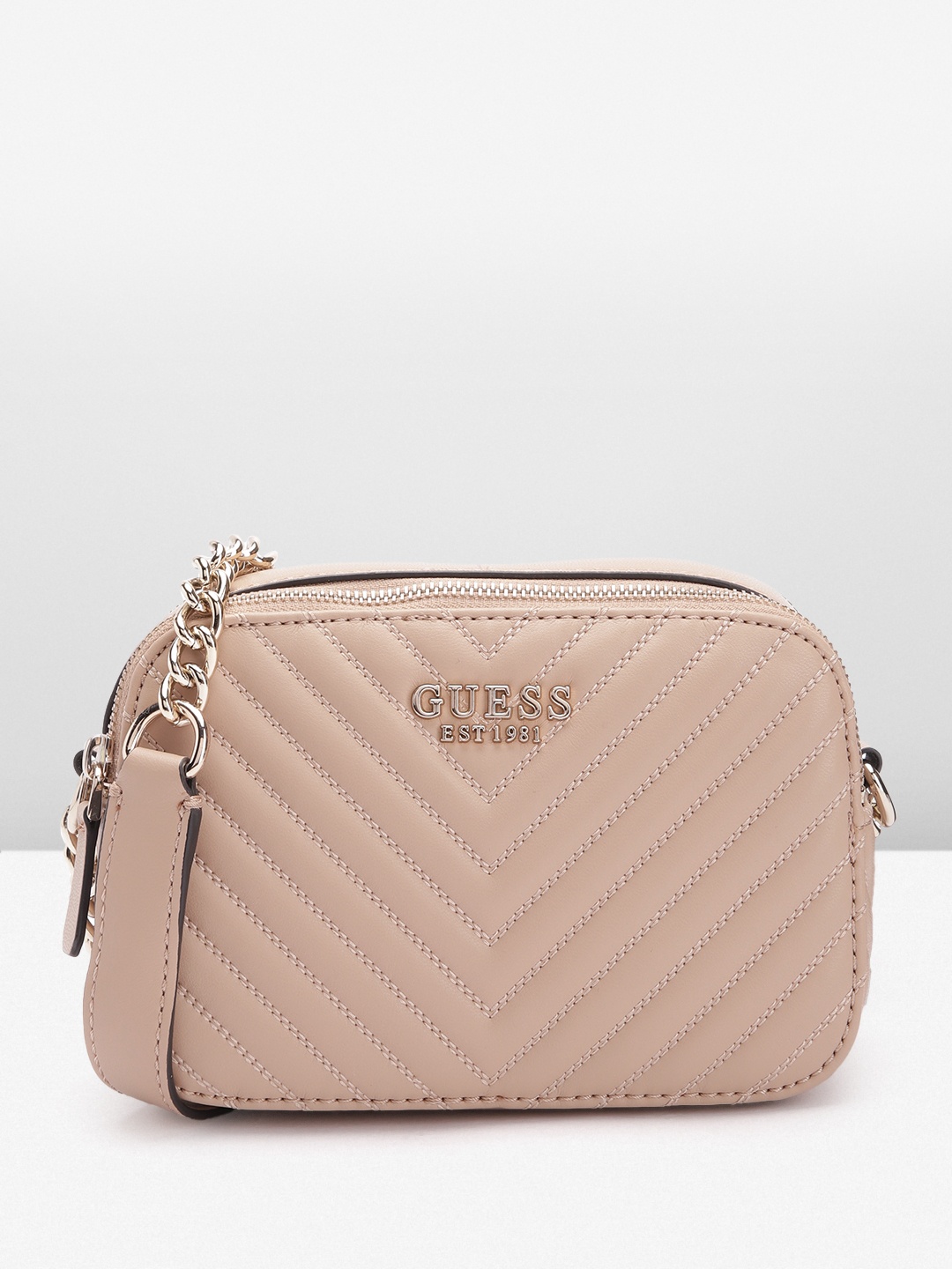 

GUESS Structured Sling Bag with Quilted Detail, Nude