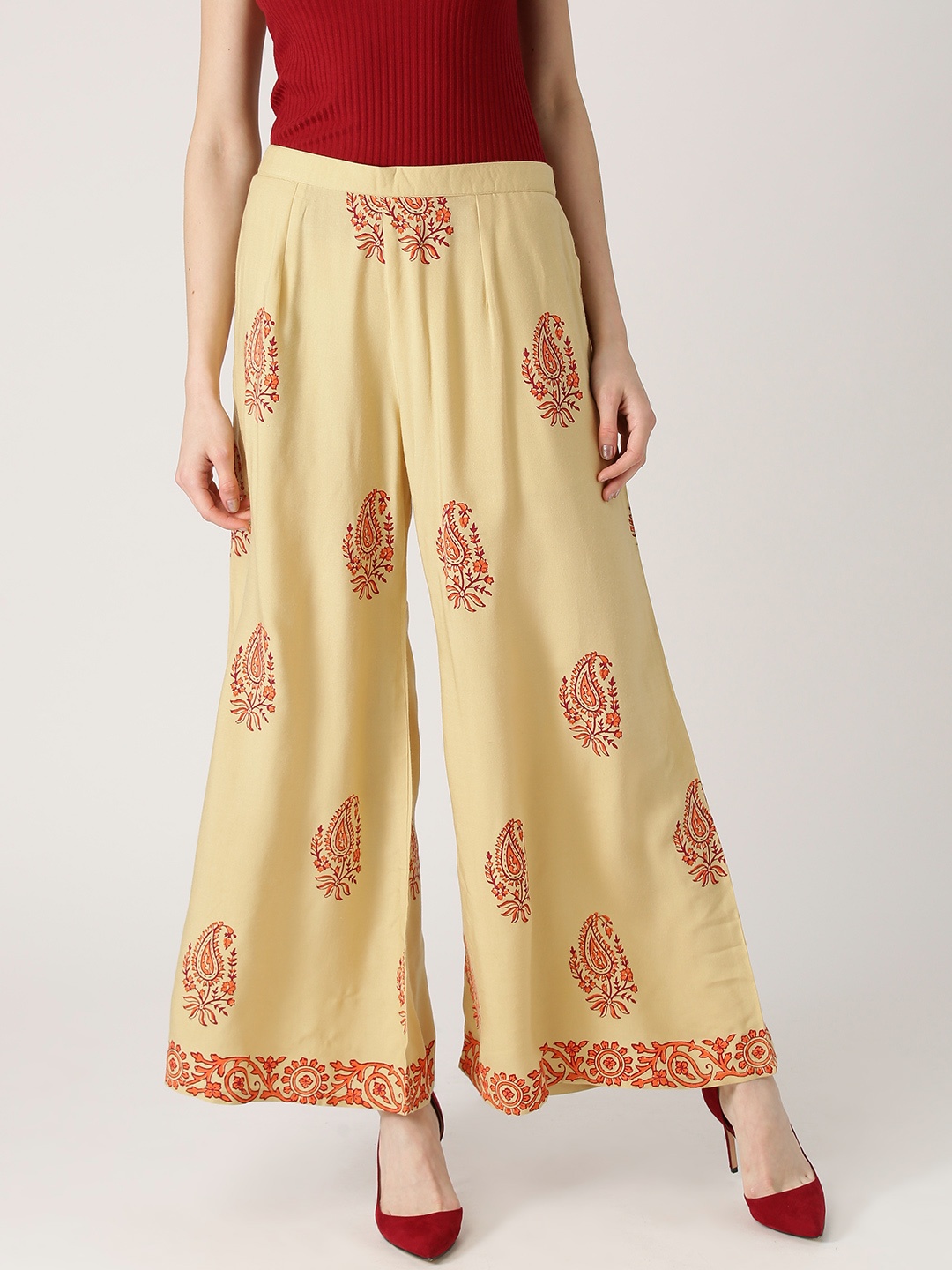 

Libas Women Beige Printed Flared Palazzos