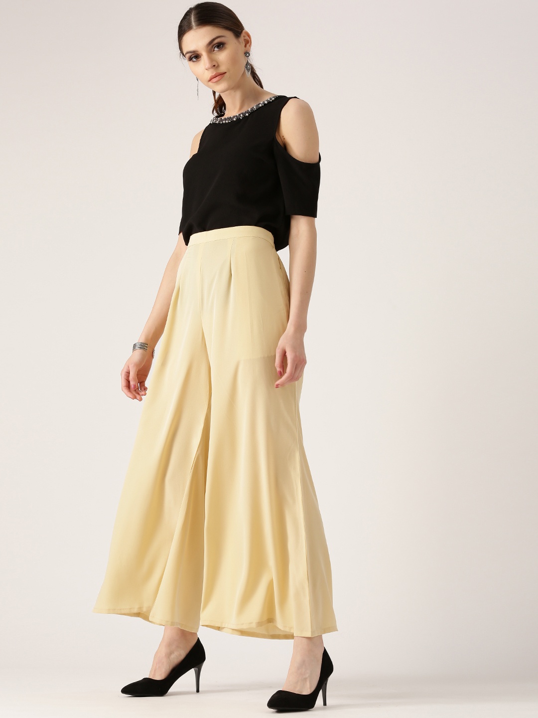 

Libas Women Beige Flared Solid Palazzos