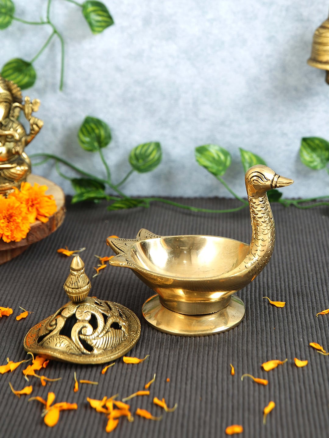

Imli Street Gold Toned Textured Dhoopdani Brass Idol Showpiece