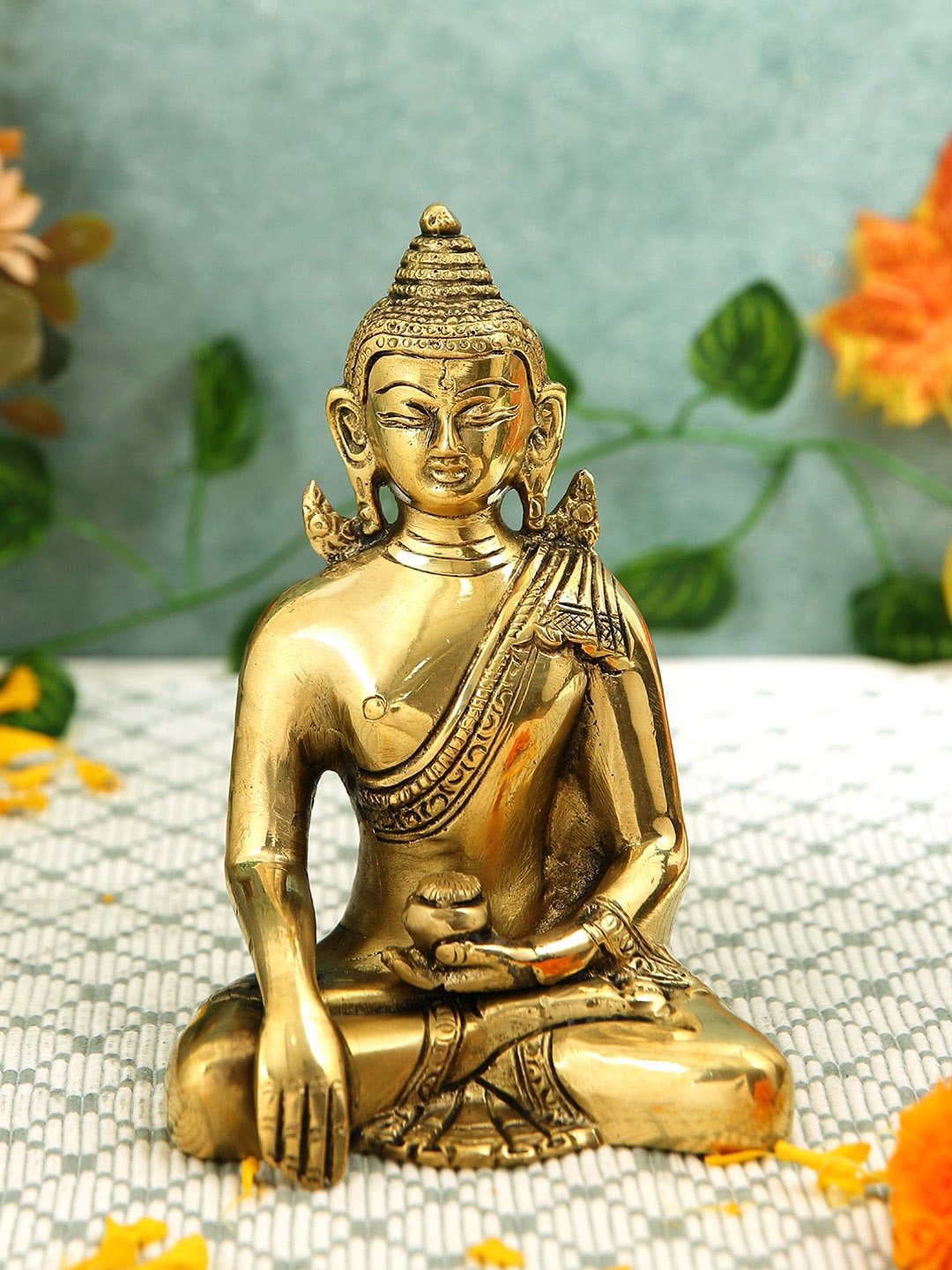 

Imli Street Gold Toned Textured Buddha Sitting Brass Idol Showpiece