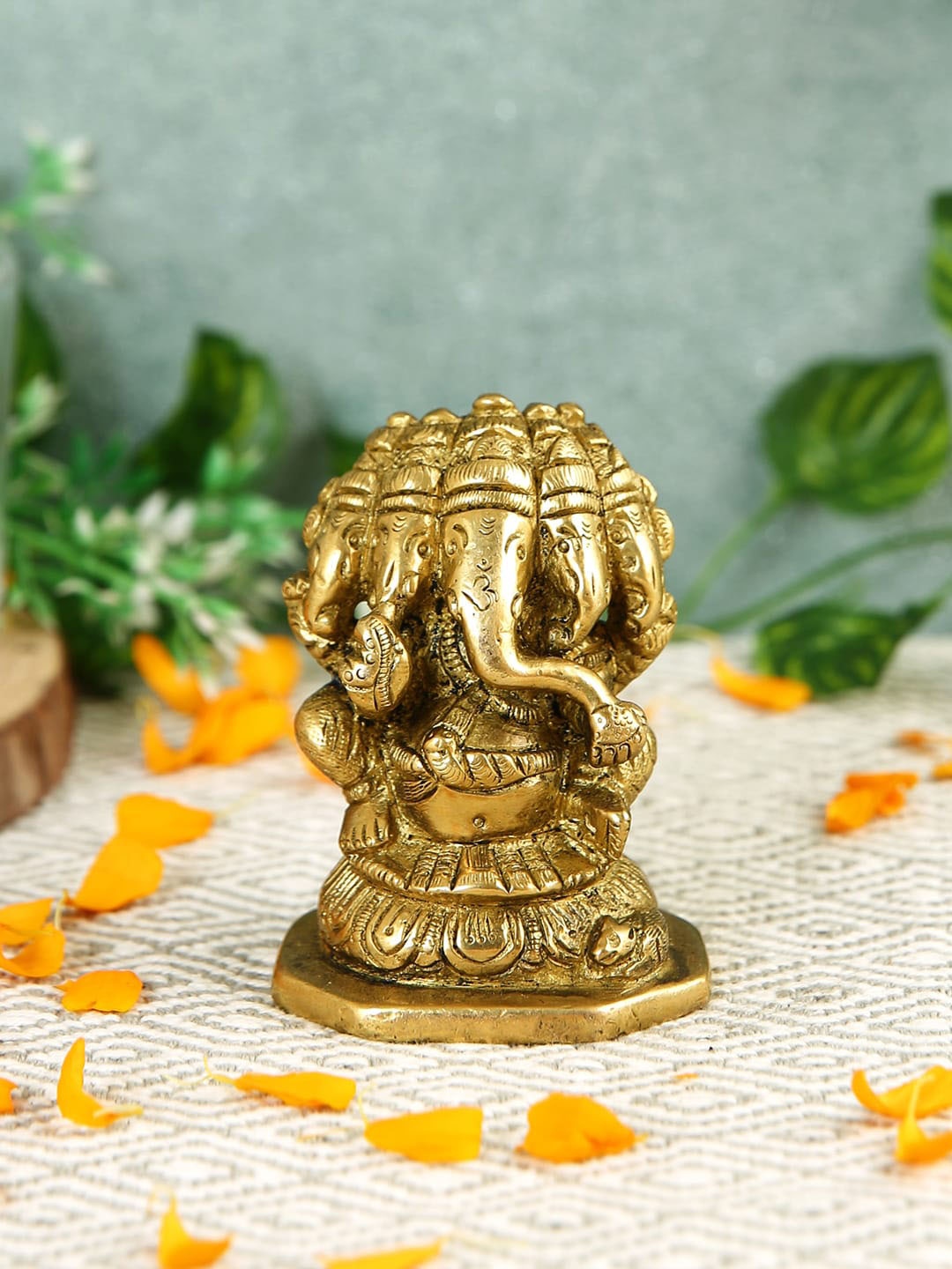 

Imli Street Brown Textured Panch Mukhi Ganesh Brass Idol Showpiece