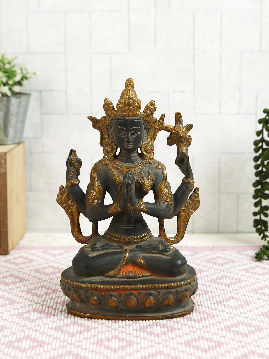 

Imli Street Black & Gold Toned Textured Tara Brass Idol Showpiece