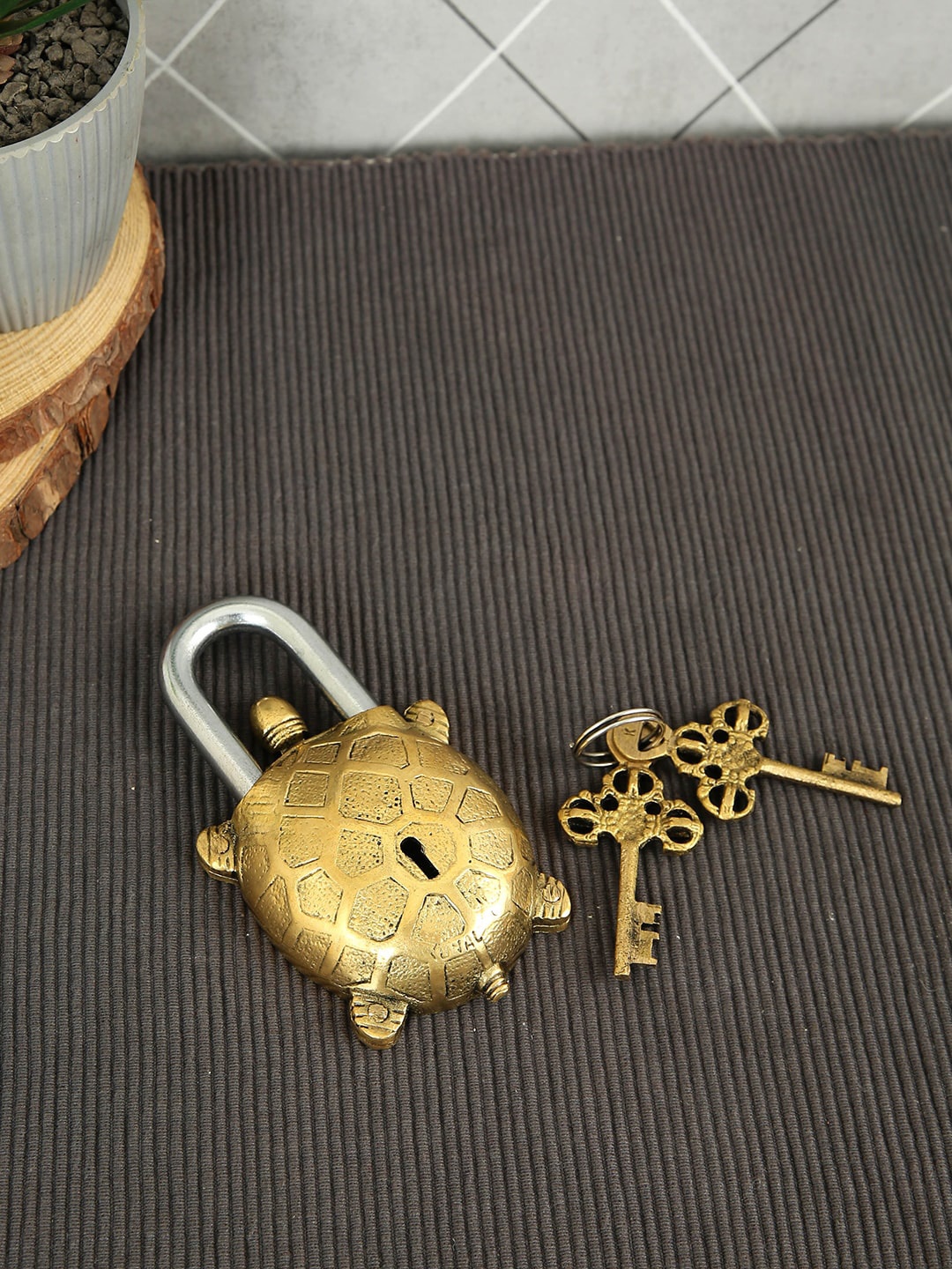 

Imli Street Gold Toned Textured Tortoise Design Lock Brass Figurine Showpiece
