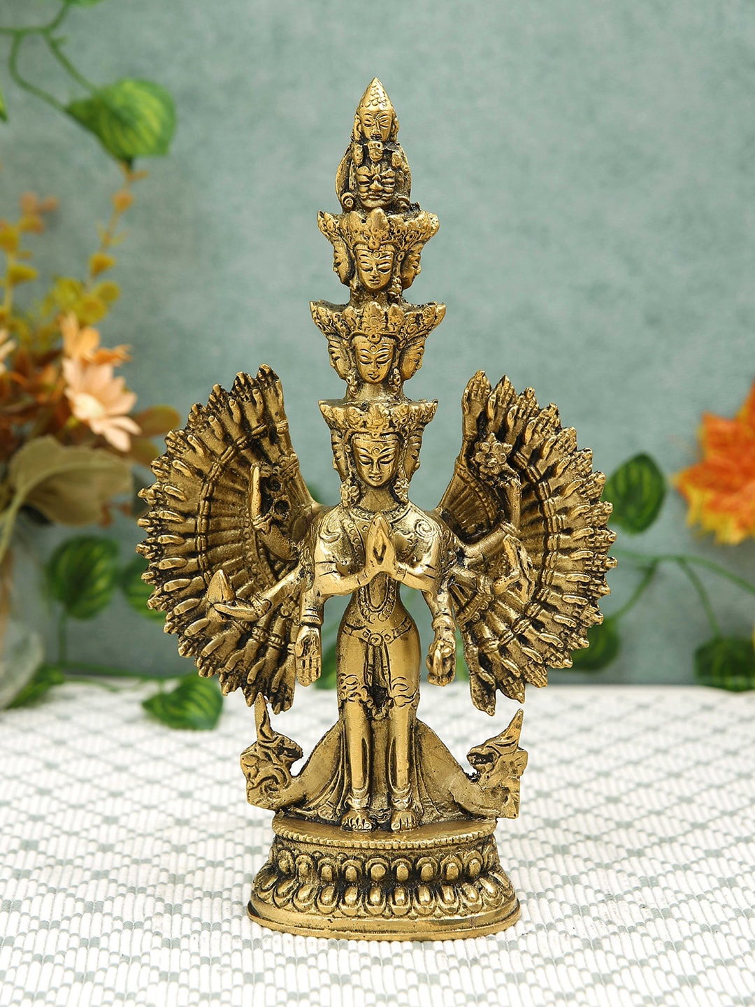 

Imli Street Gold Toned Textured Tibetan Buddha Many Arms Lokeshwar Brass Idol Showpiece