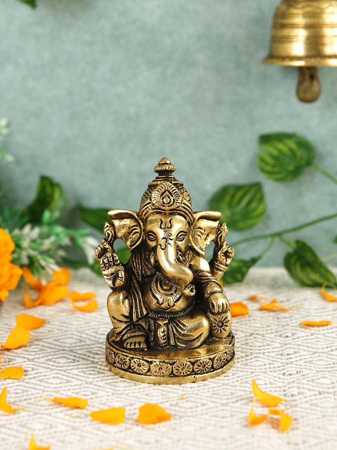 

Imli Street Gold Toned & Black Textured Ganesh Brass Idol Showpiece