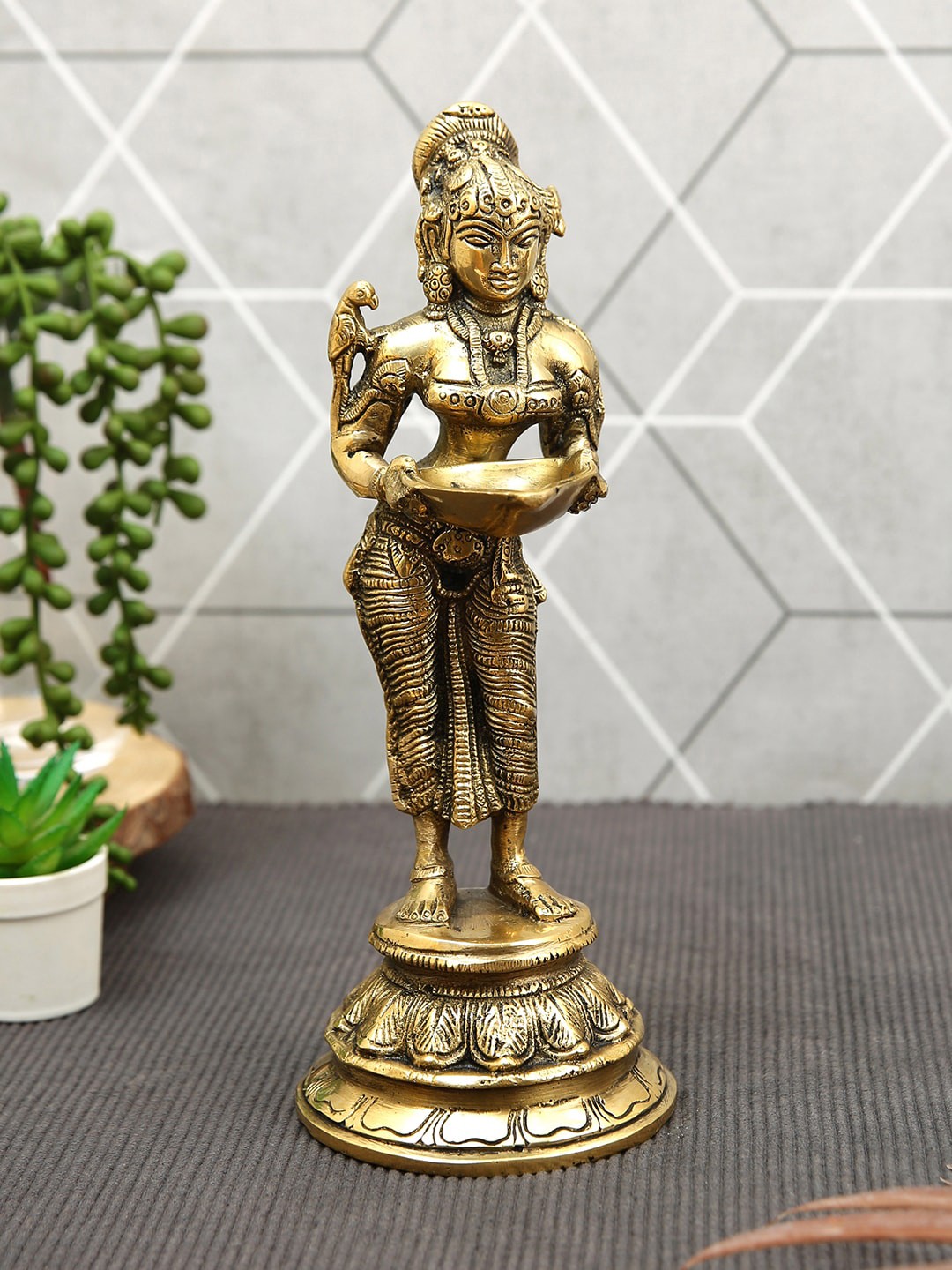 

Imli Street Bronze Toned Deeplaxmi Diya Standing Idol Showpiece