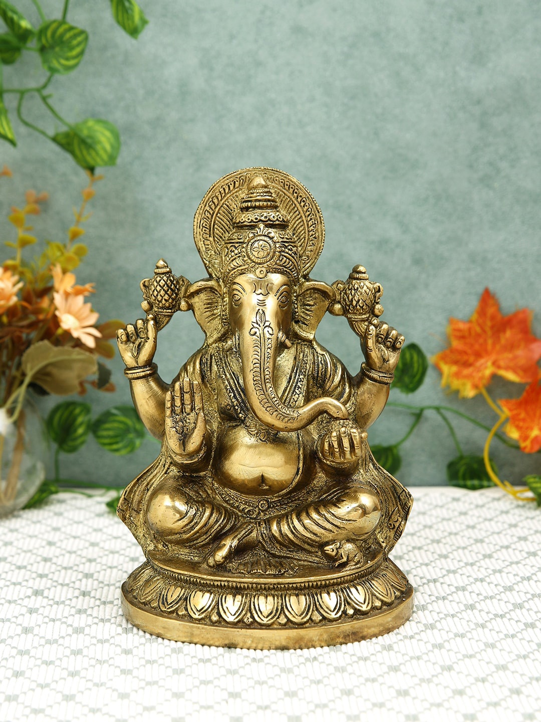 

Imli Street Gold Toned Textured Brass Ganesha Idol Showpiece