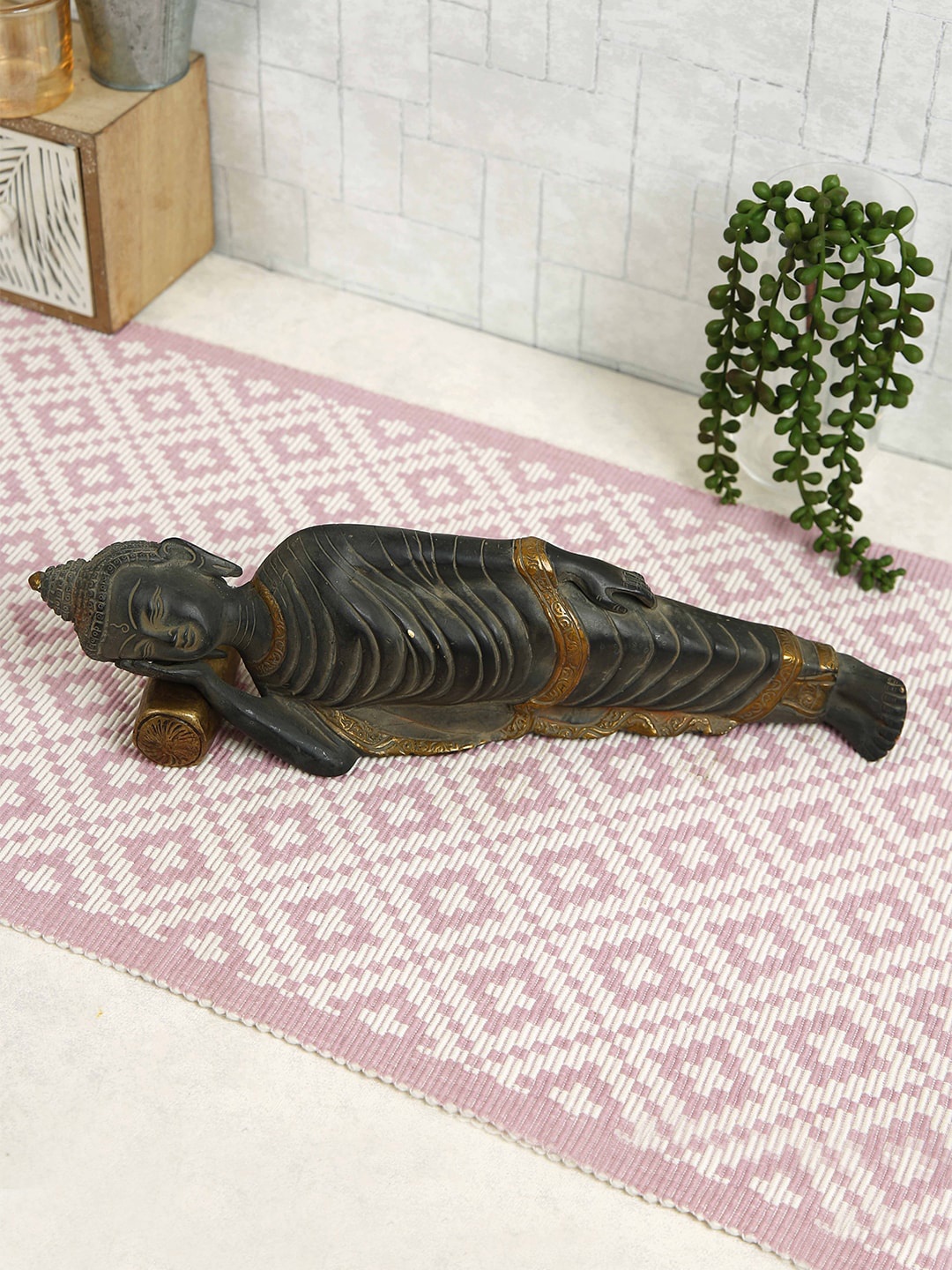 

Imli Street Black & Golden Sleeping Buddha Idol Brass Showpiece