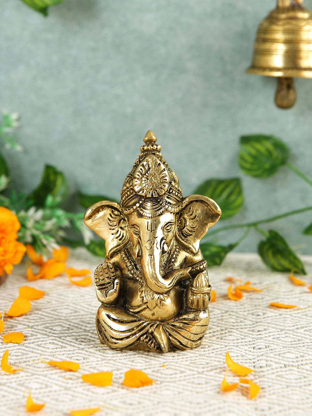 

Imli Street Gold Toned Textured Ganesh Brass Idol Showpiece