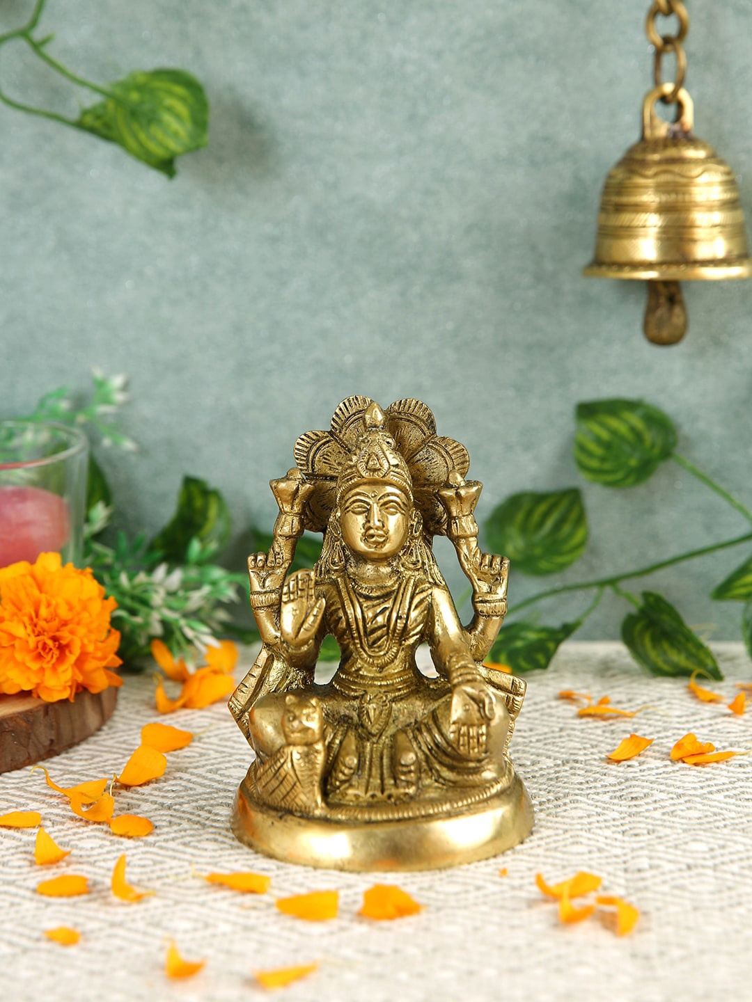 

Imli Street Yellow Textured Lakshmi Idol Showpieces
