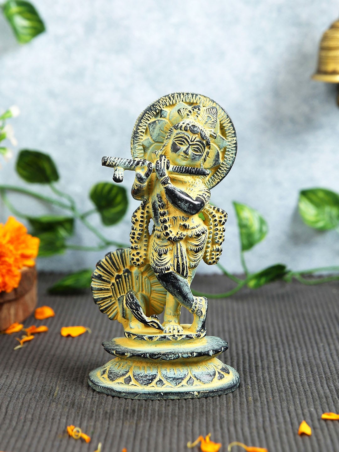 

Imli Street Yellow & Black Textured Krishna Brass Idol Showpiece