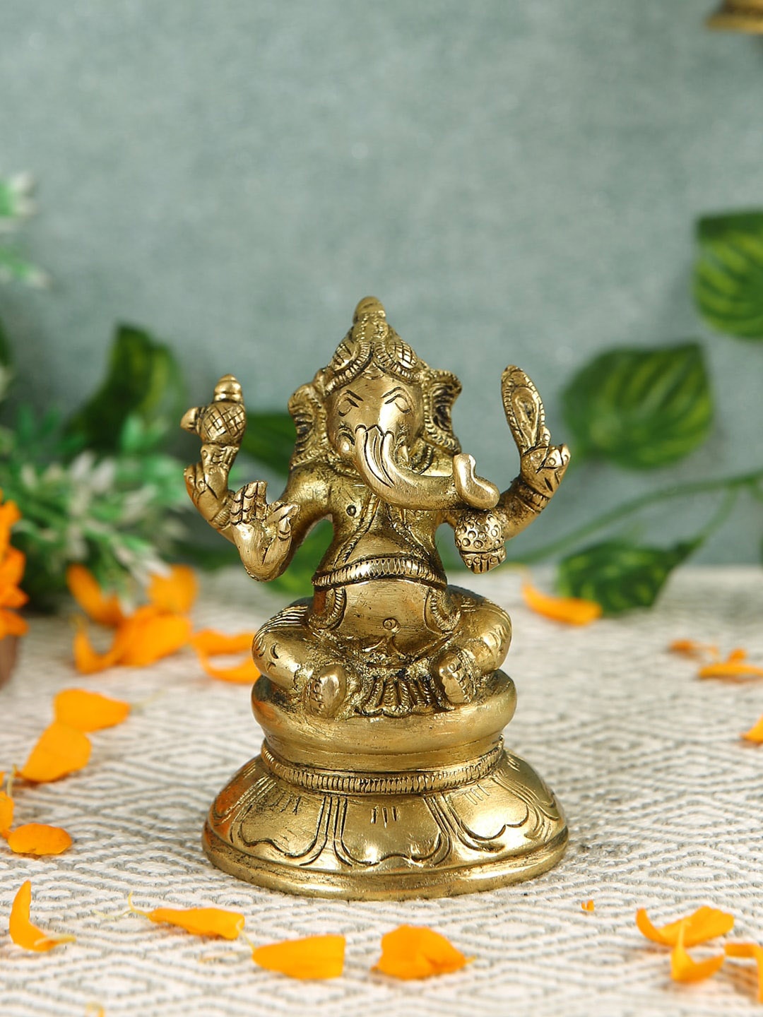 

Imli Street Yellow Textured Ganesh Brass Idol Showpieces