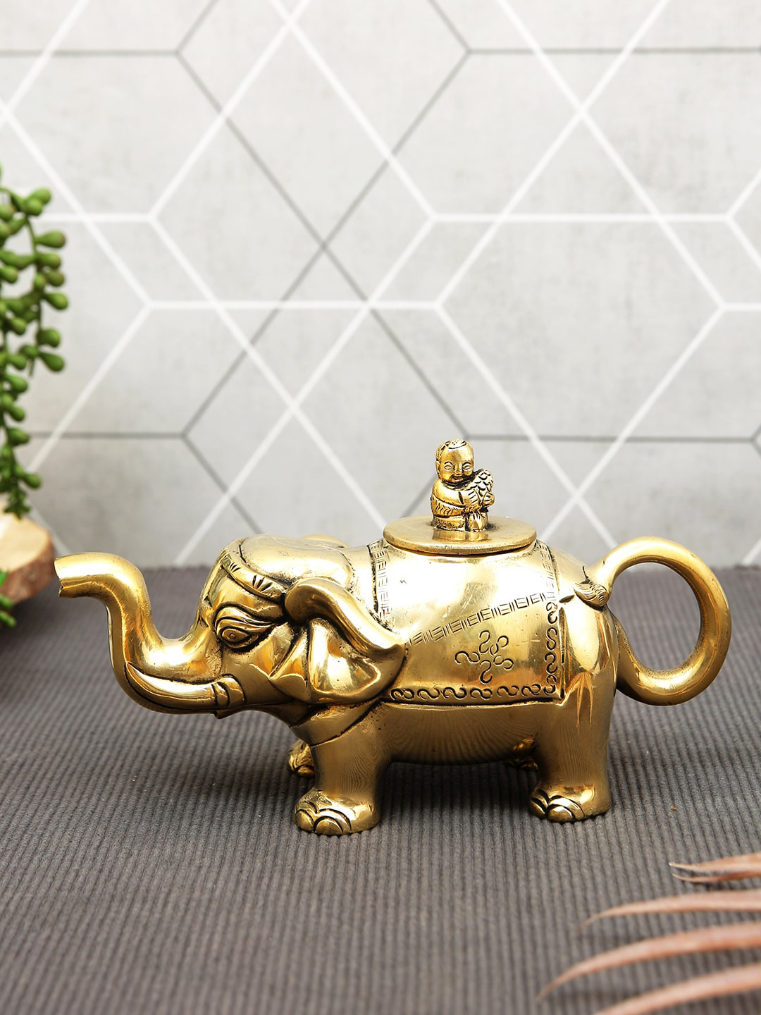 

Imli Street Golden Textured Elephant Kettle Design Figurine Brass Showpiece, Gold