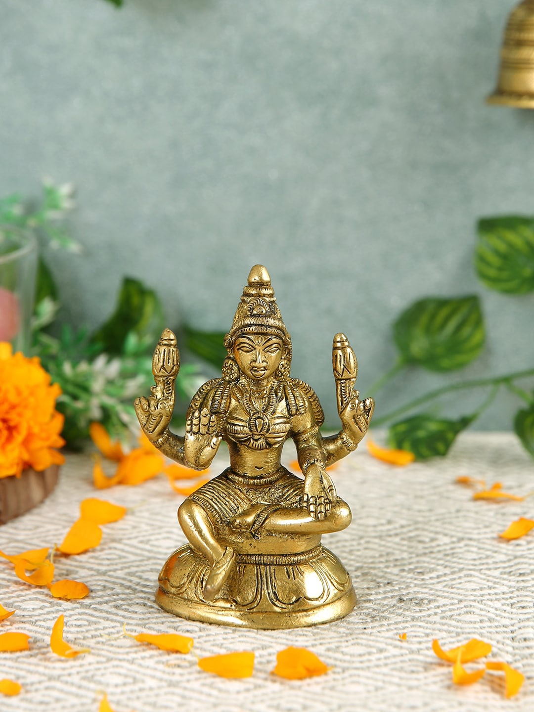 

Imli Street Yellow Textured Lakshmi Idol Figurine Showpieces
